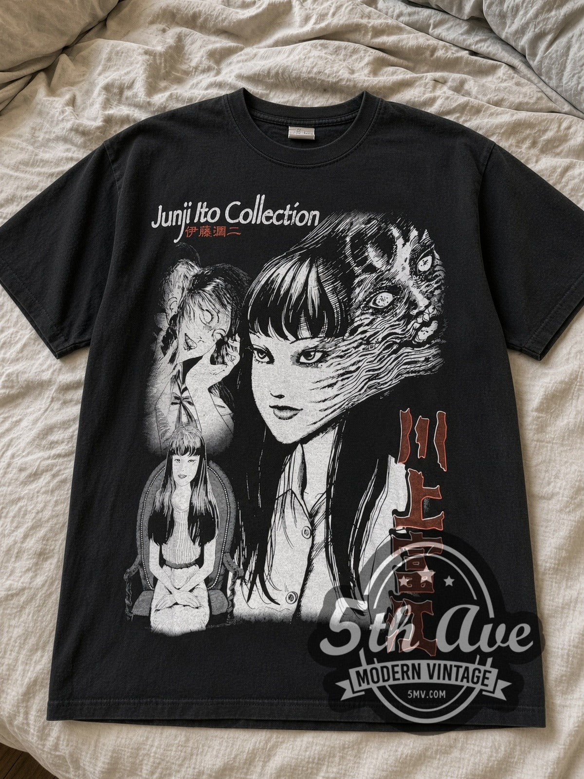 Black Junji Ito Tomie anime tee laid flat on linen bed