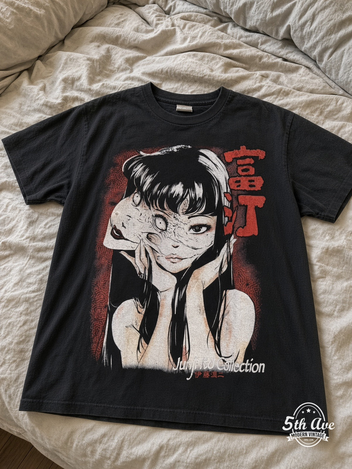 Junji Ito Tomie Collection vintage tee laid on bed