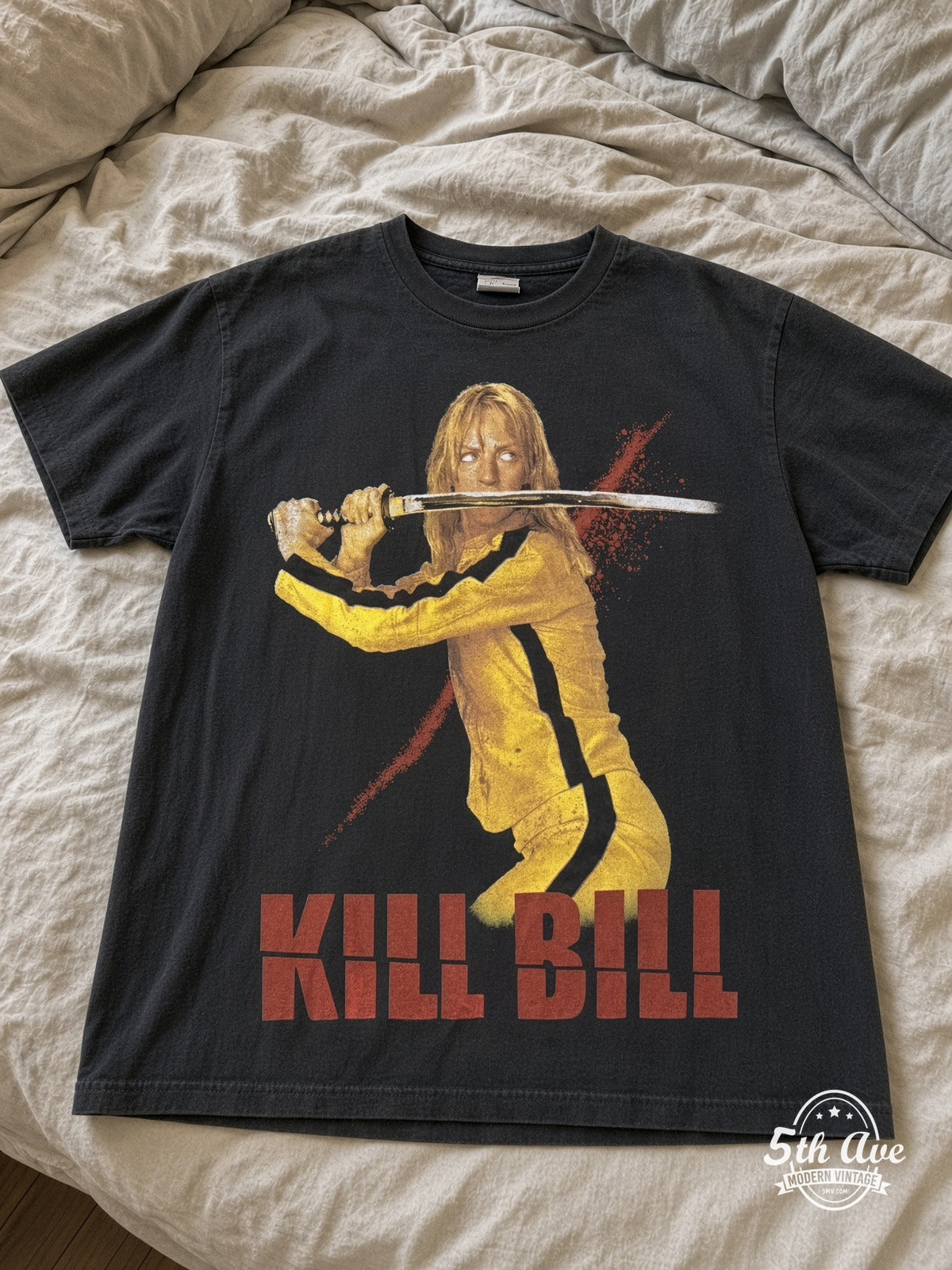 Kill Bill The Bride Uma Thurman vintage tee laid on bed