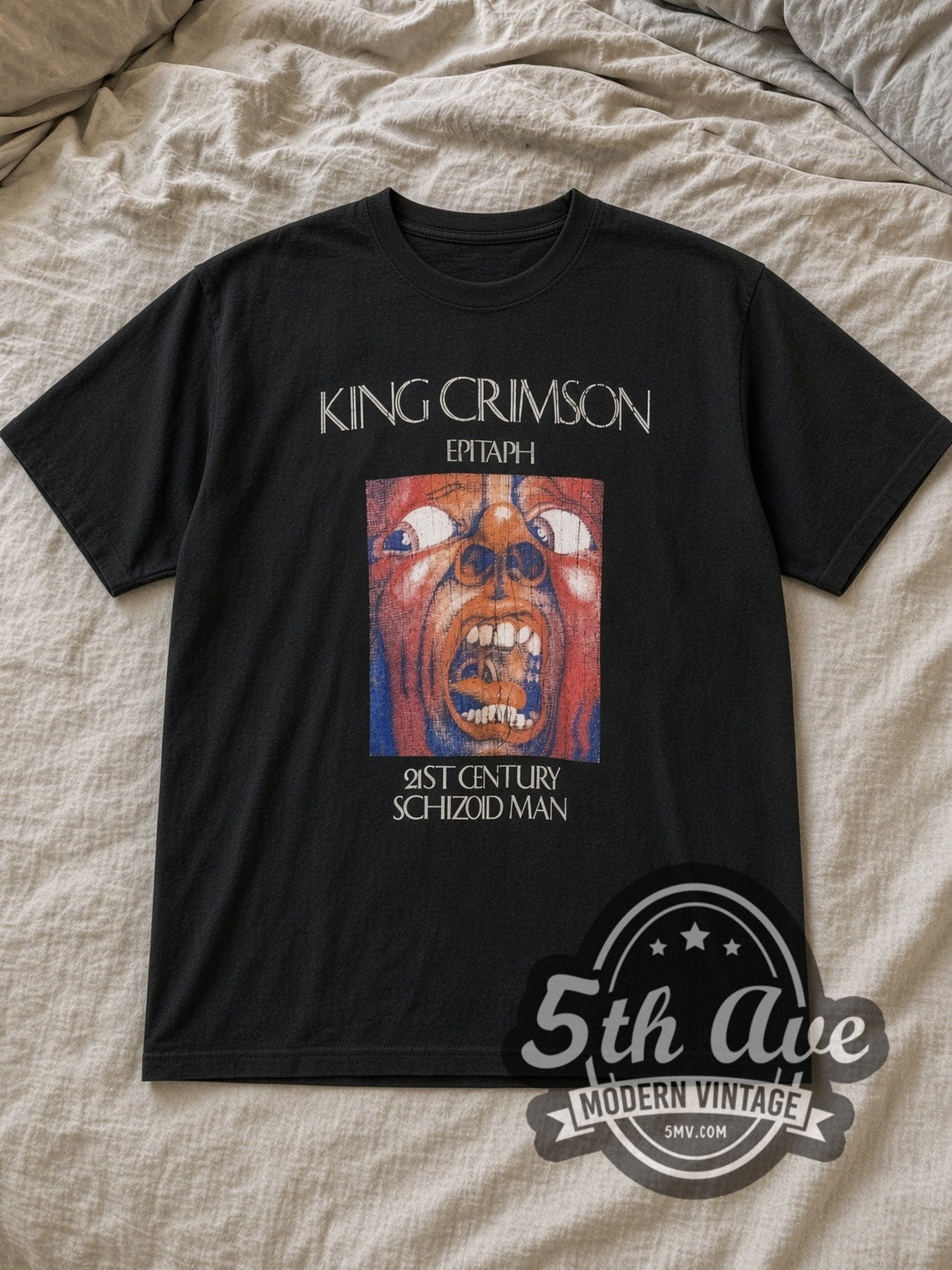 Black King Crimson Epitaph Schizoid Man Washed Black Vintage Band T-Shirt laid flat on a linen bed