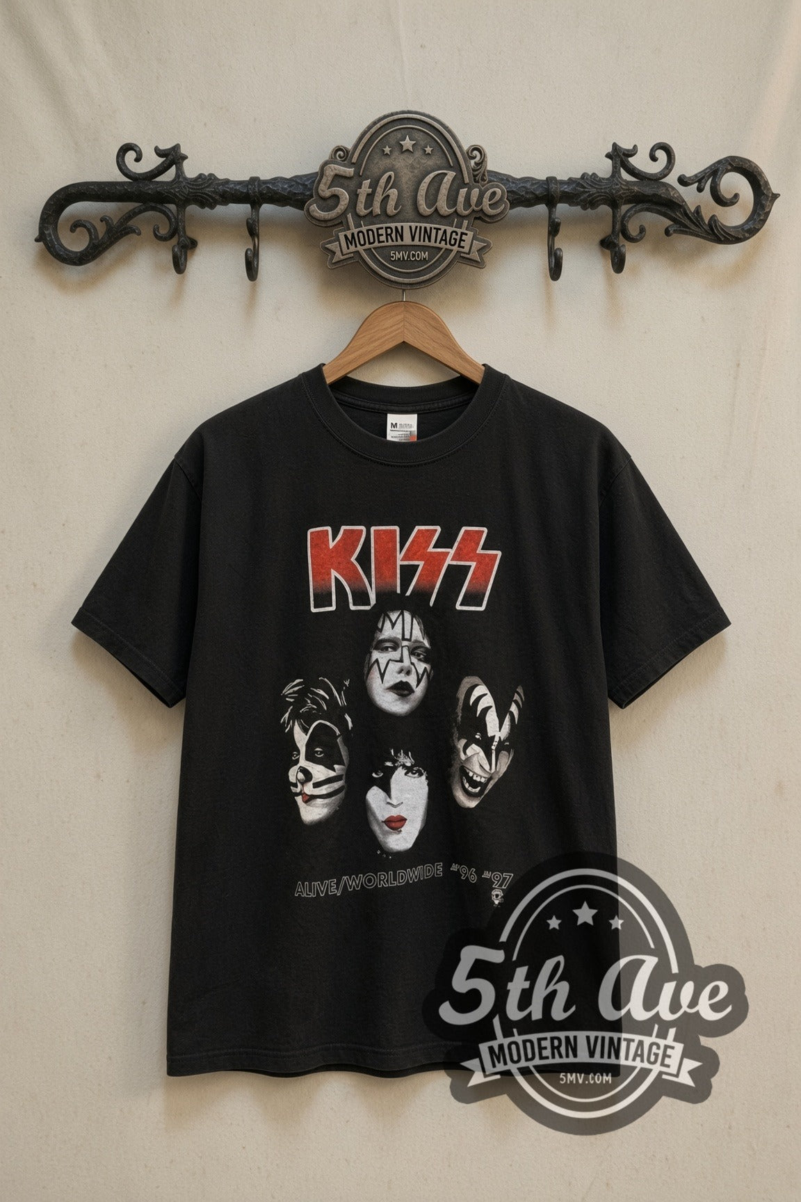 KISS Alive Worldwide I Wanted the Best band t-shirt in black, front view on a display rack
