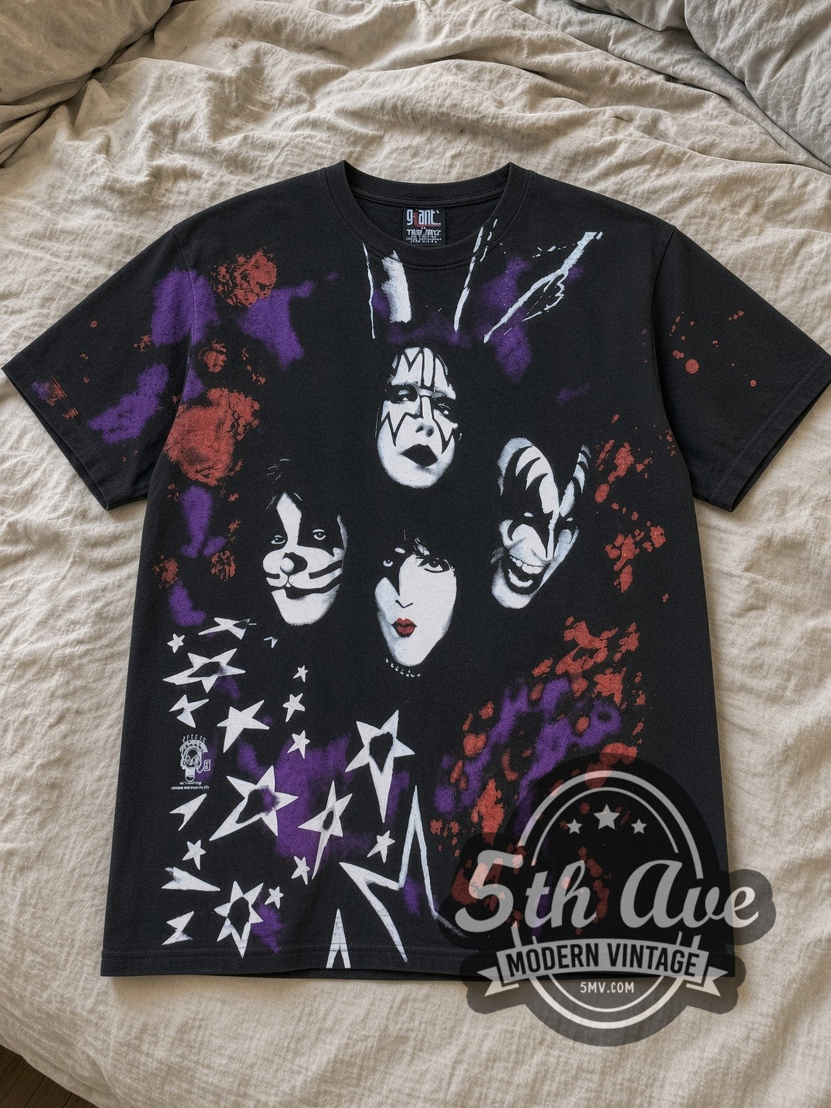 Black KISS Alive/Worldwide Tour All Over Print Vintage Band T-Shirt laid flat on a linen bed