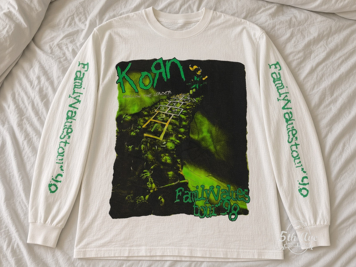 Korn Follow the Leader Family Values Tour 98 long sleeve vintage t-shirt laid on bed