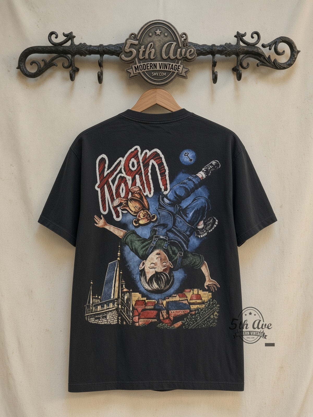 Korn Girl, Tiger and Upside-Down Boy City vintage band t-shirt back on cream 5th Ave rack