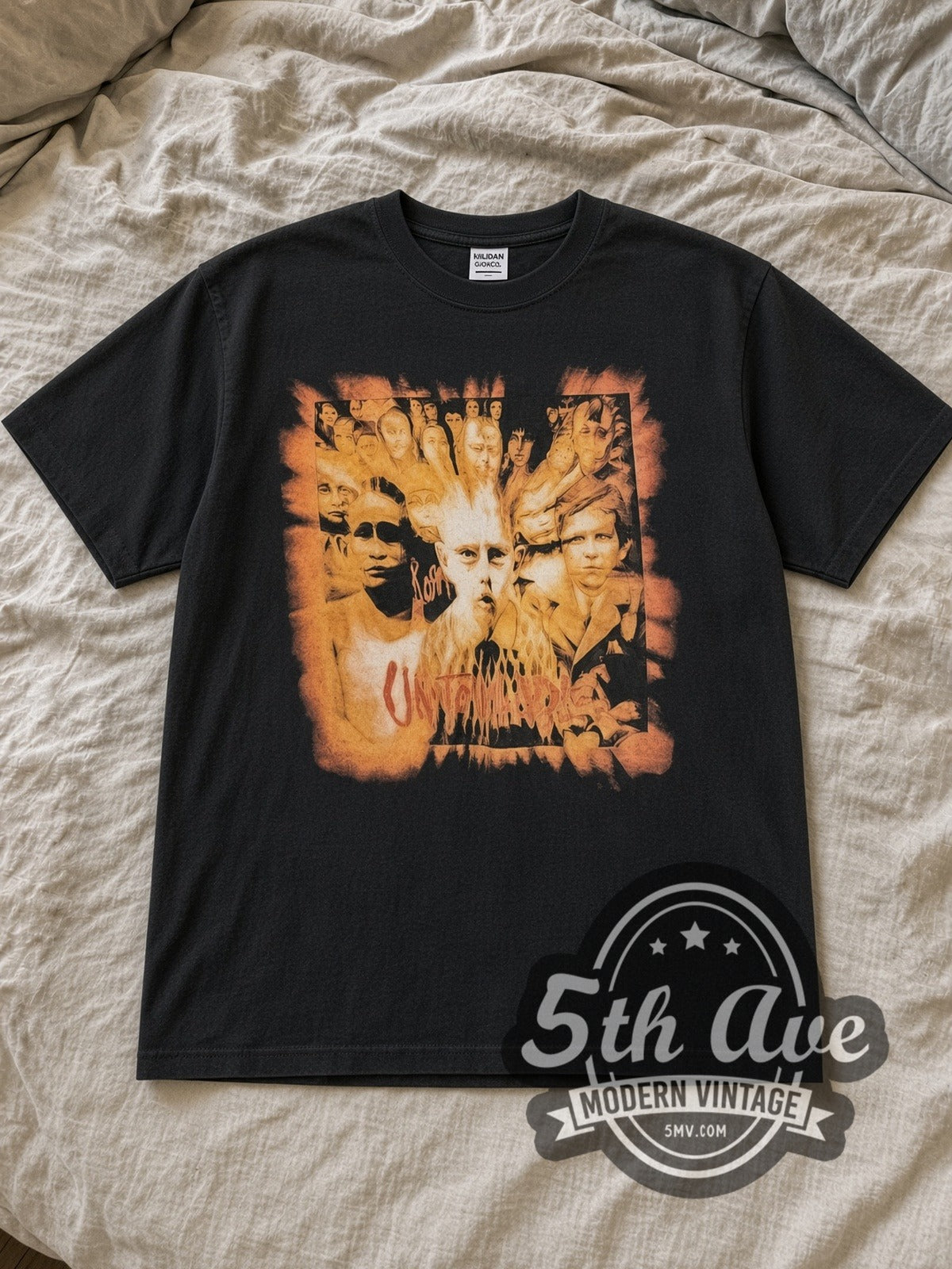 Black Korn World Tour 2002 Vintage Band T-Shirt laid flat on a linen bed