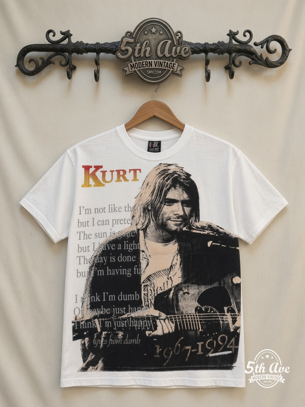 Kurt Cobain 1967-1994 Live At Last all over print vintage band t-shirt front on cream 5th Ave rack