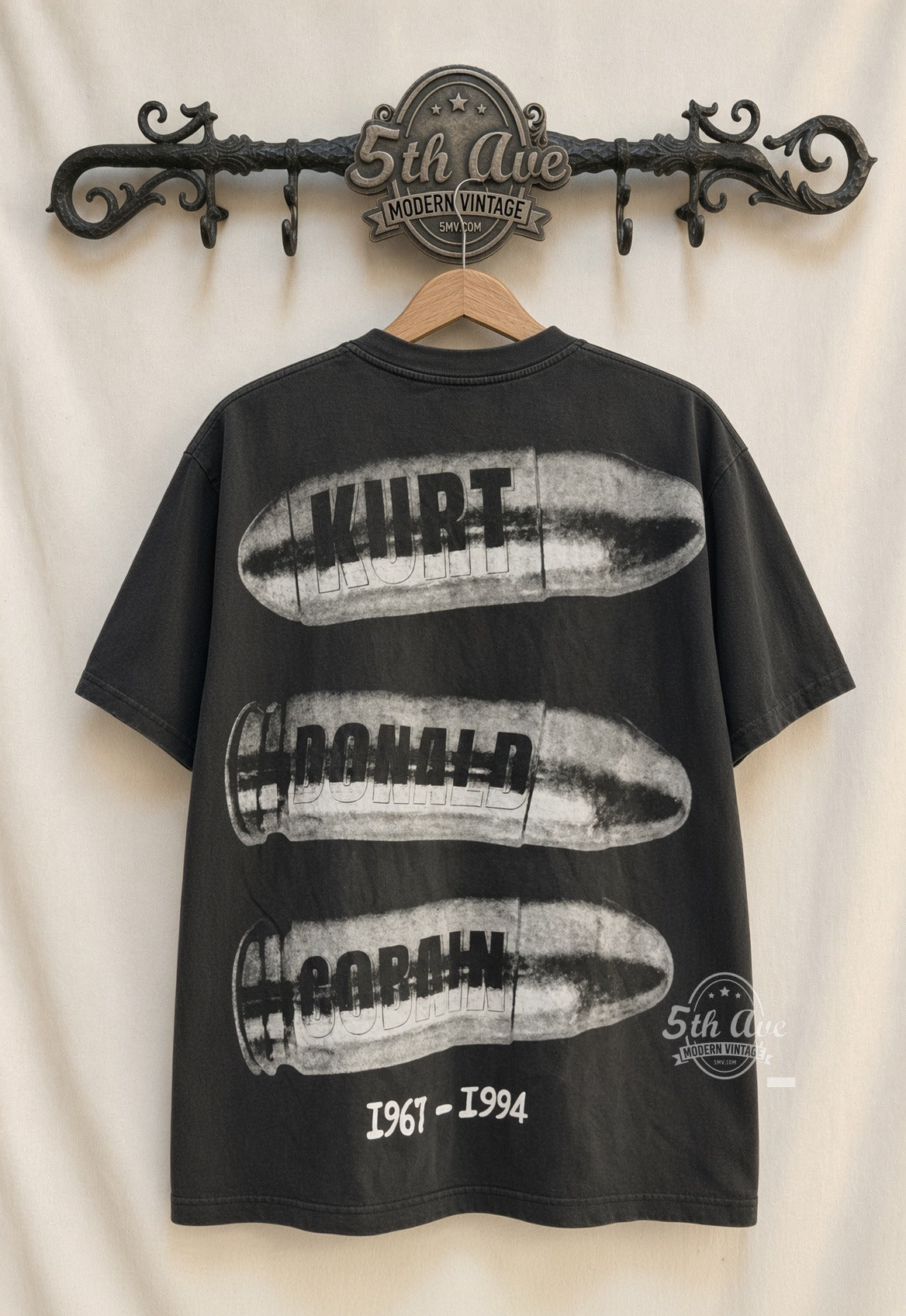 Kurt Cobain Boddah Letter Bullets 1967-1994 vintage band t-shirt back on cream 5th Ave rack