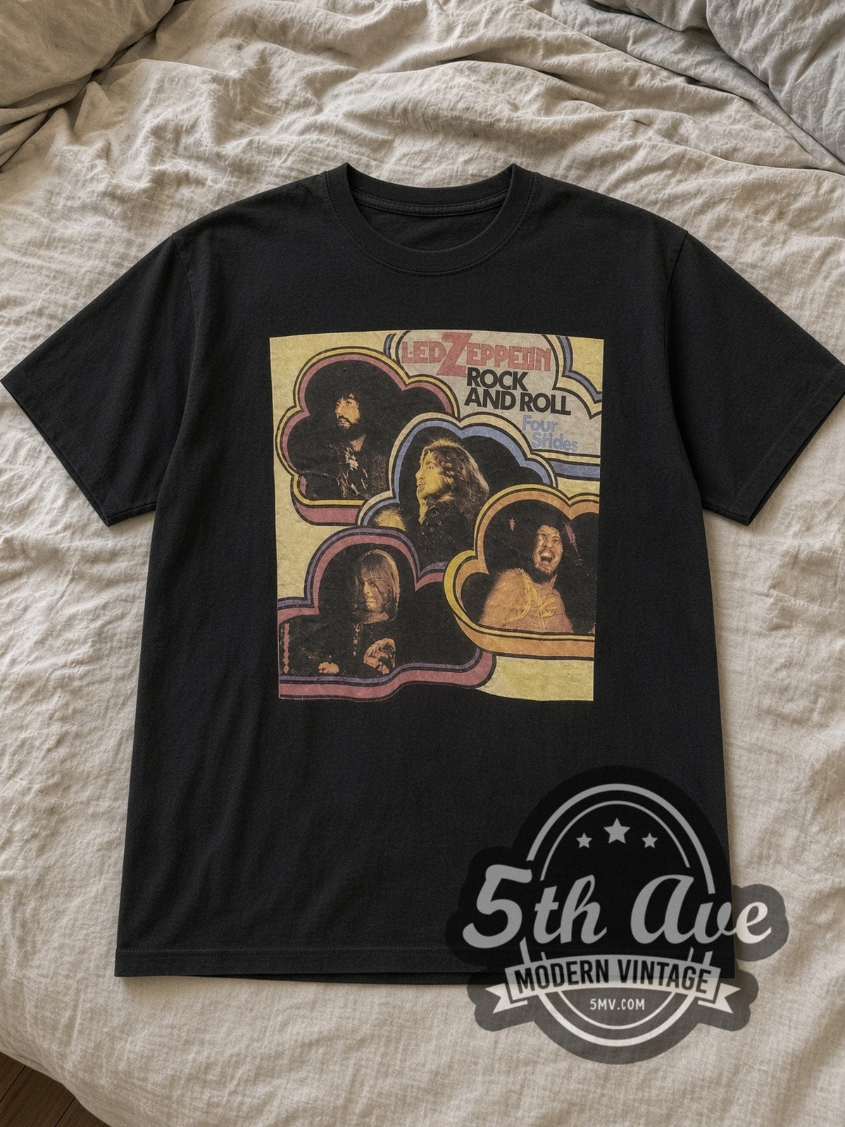 Black Led Zeppelin Clouds Portrait Style Vintage Band T-Shirt laid flat on a linen bed