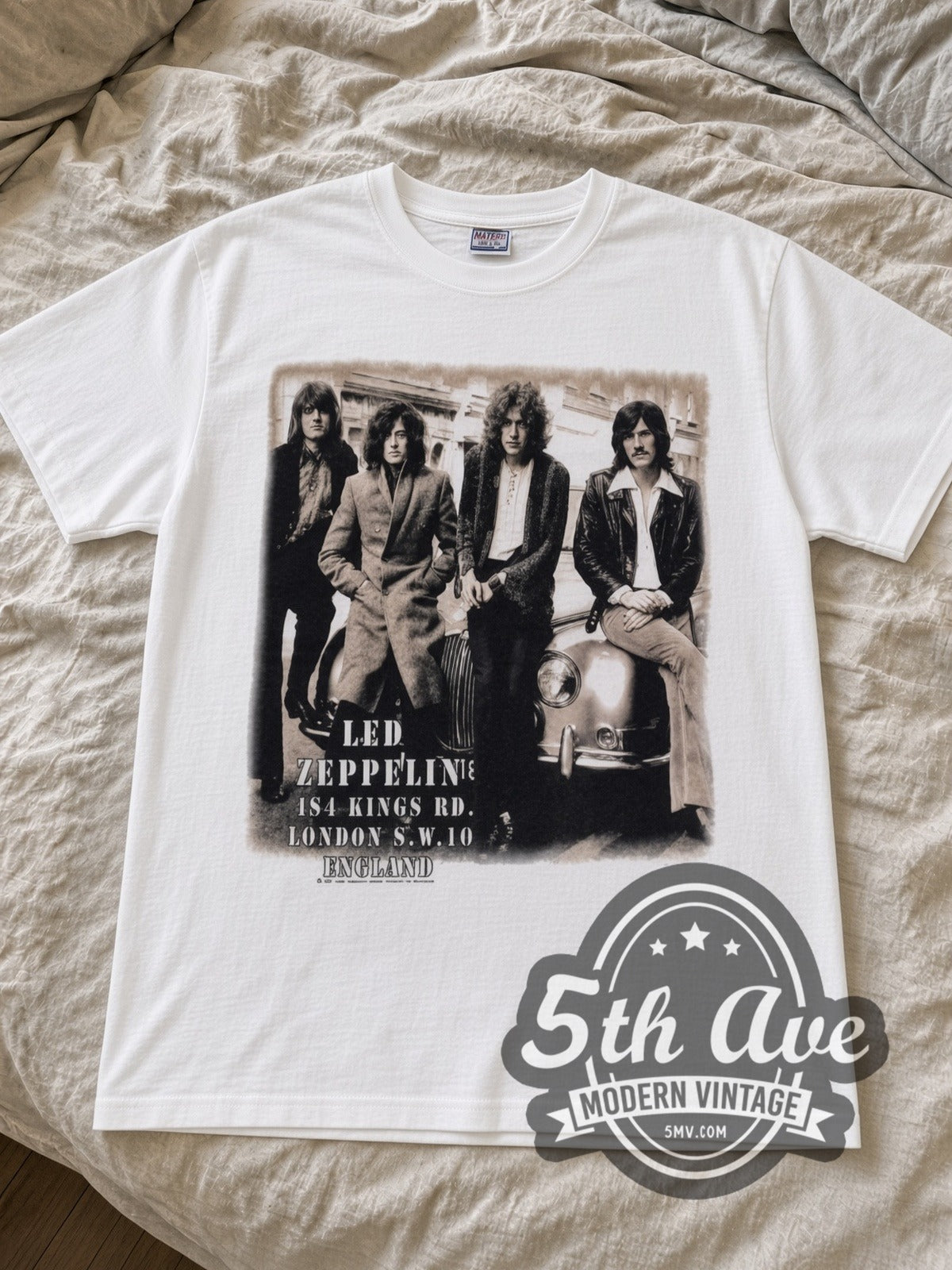 Led Zeppelin Starship Jet & Kings Rd Photo band t-shirt in white laid flat on a bed, front artwork