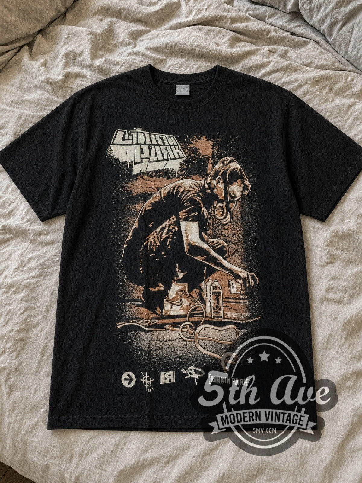 Black Linkin Park Retro Graphic Vintage Band T-Shirt laid flat on a linen bed