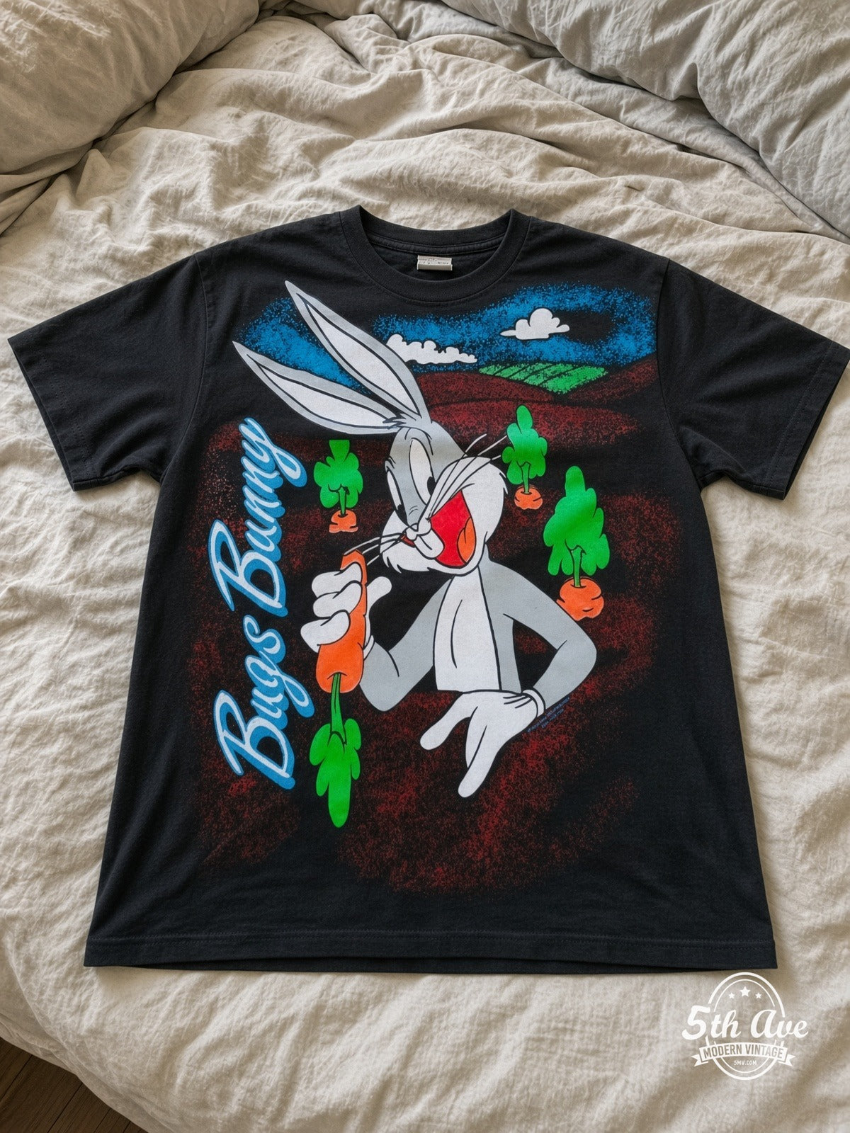 Looney Tunes Bugs Bunny Carrots Tough vintage tee laid on bed