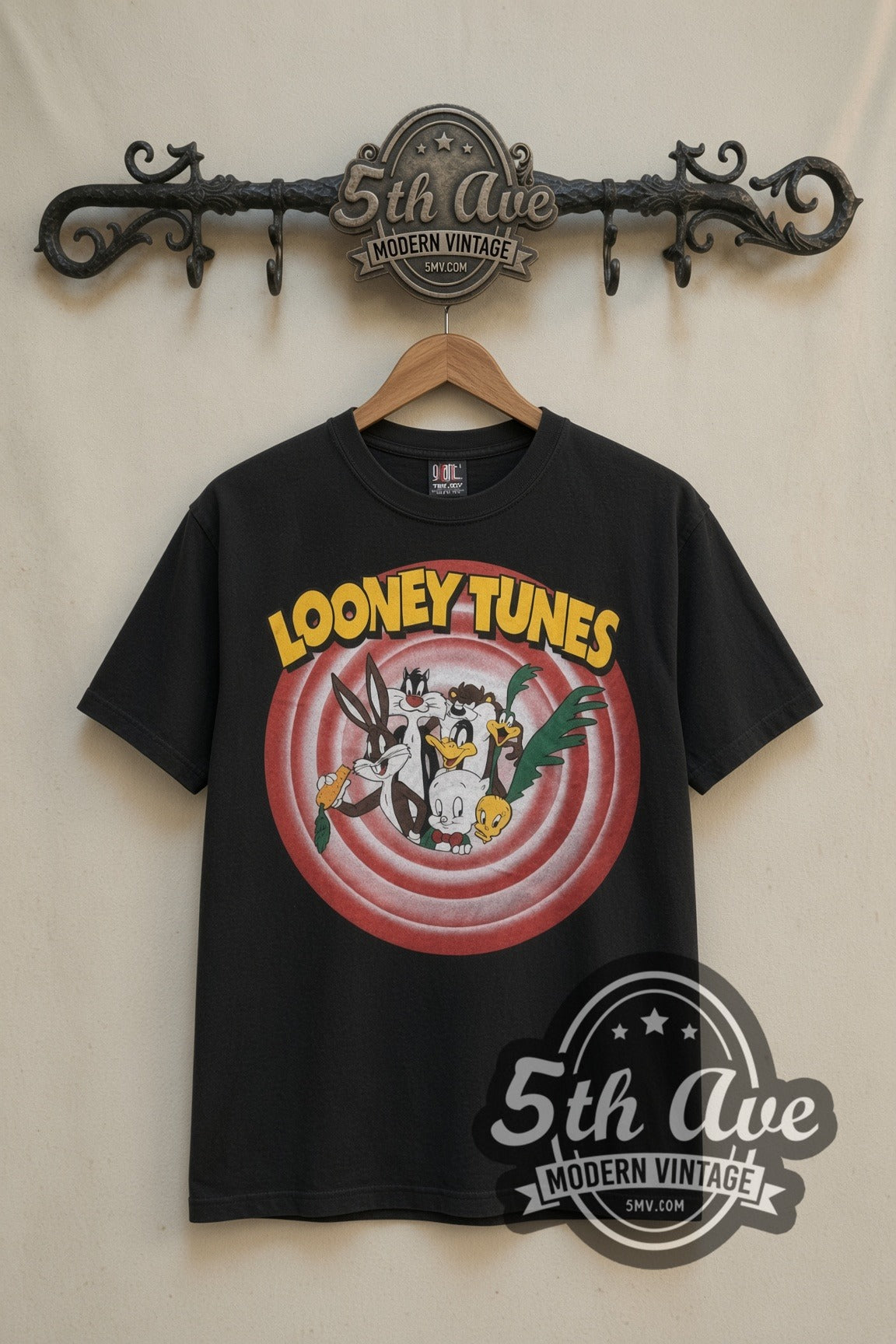 Looney Tunes Bullseye Target Bugs Taz Daffy cartoon tee in black, front view on a display rack