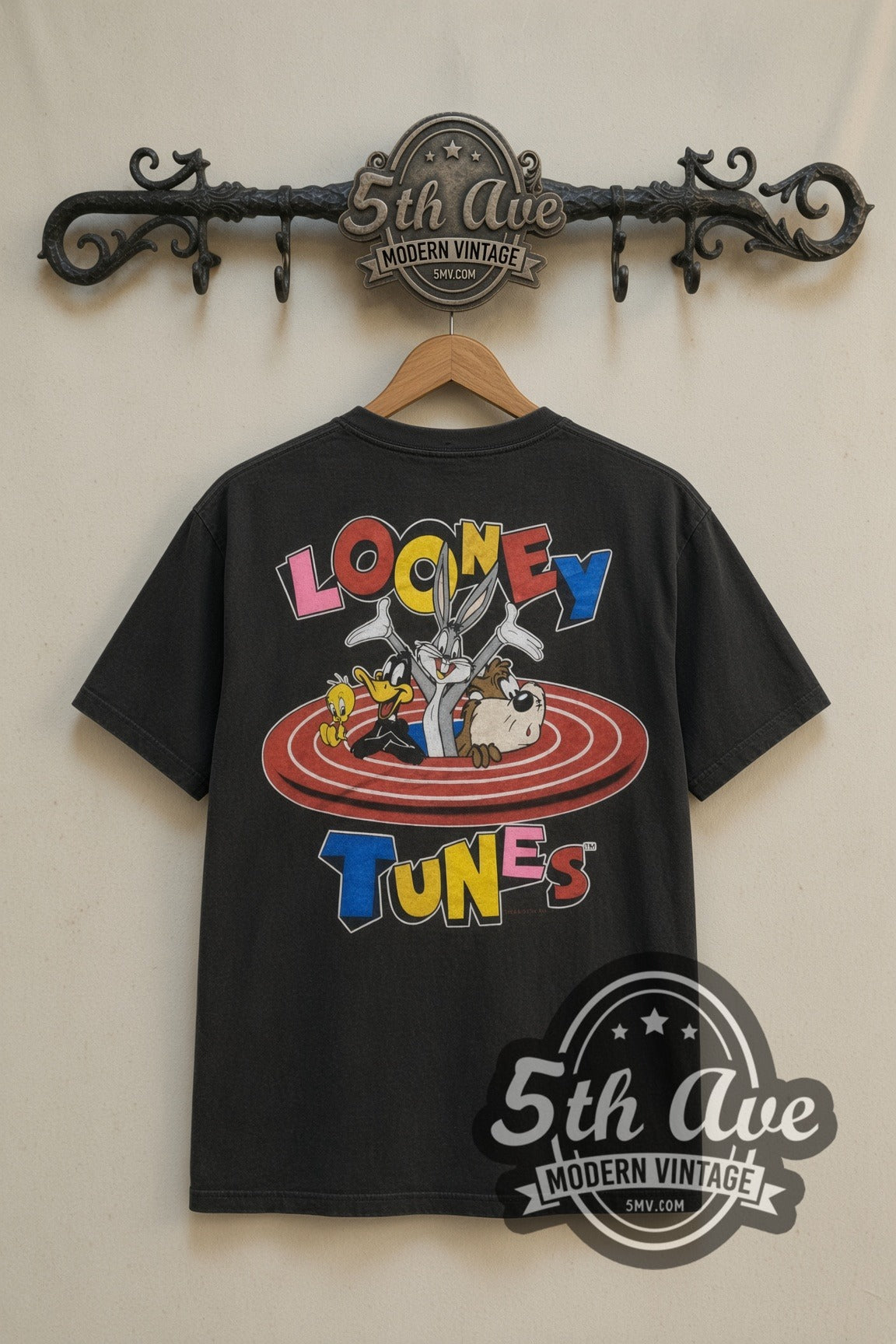 Looney Tunes Bullseye Target Bugs Taz Daffy cartoon tee in black, back view on a display rack