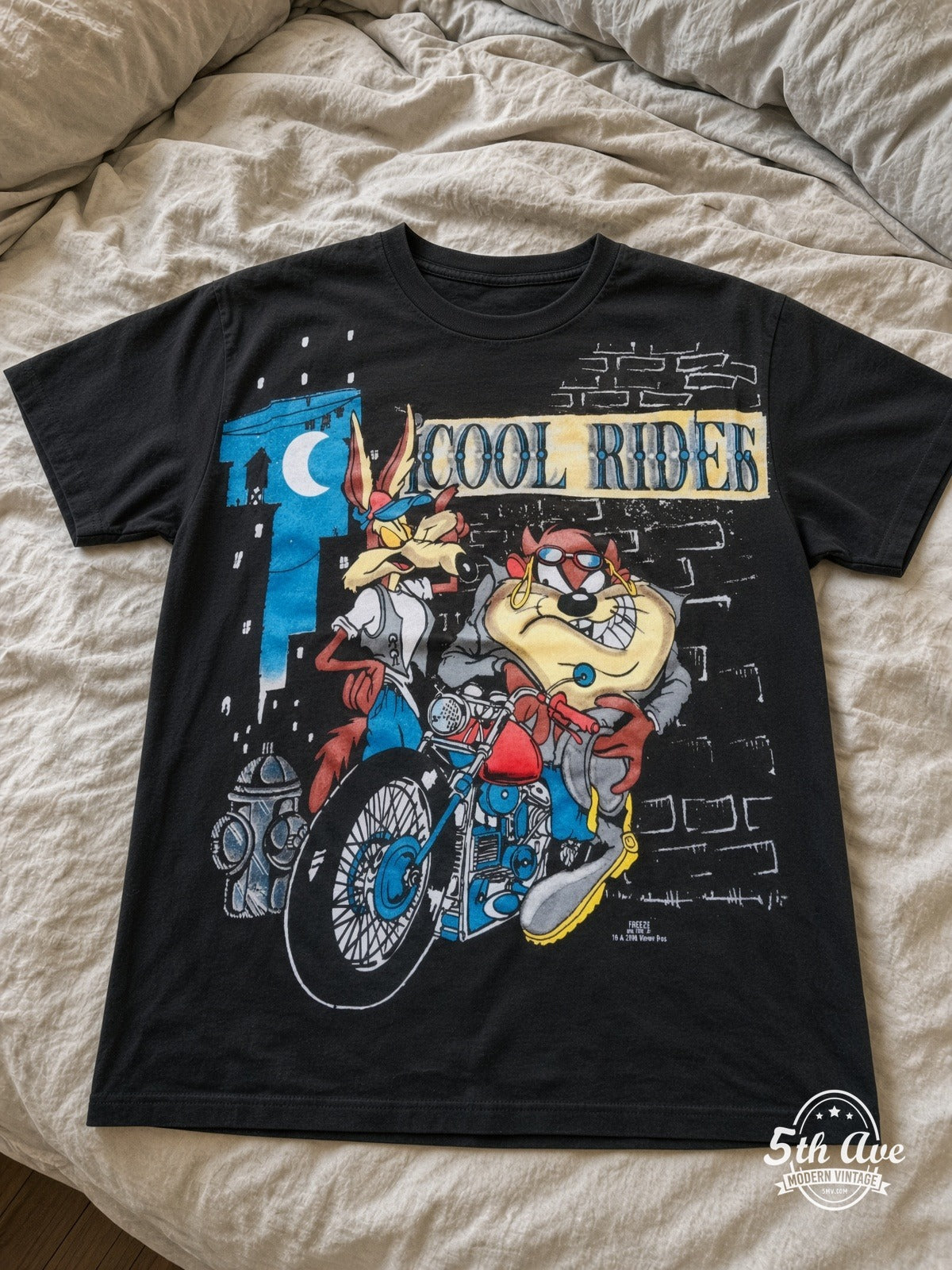 Looney Tunes Cool Riders Taz Wile E Motorcycle vintage tee laid on bed