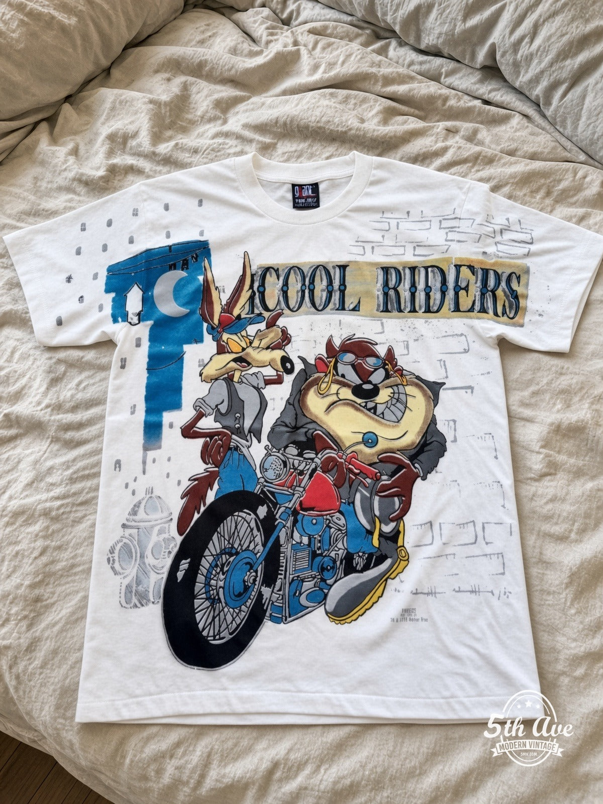 Looney Tunes Cool Riders Taz Wile E Motorcycle vintage tee laid on bed