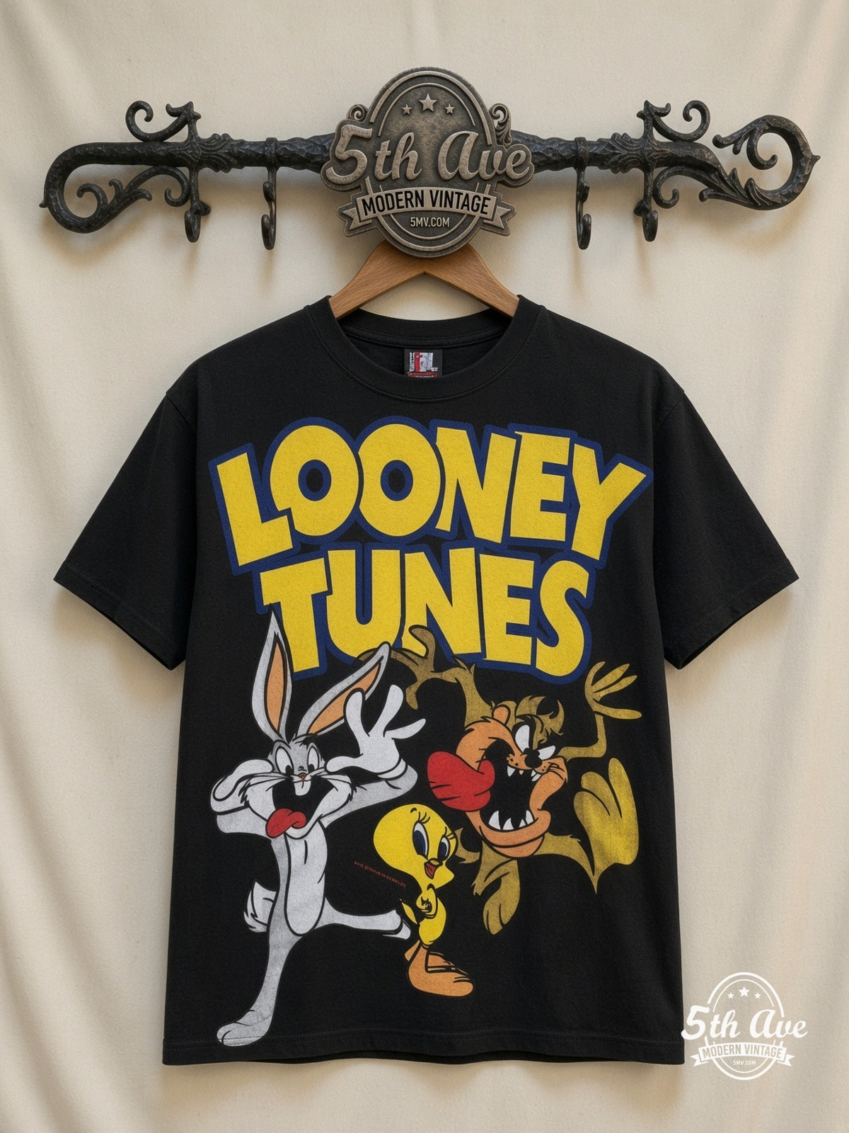 Looney Tunes Logo Bugs Tweety Taz Crew all over print vintage cartoon t-shirt front on cream 5th Ave rack