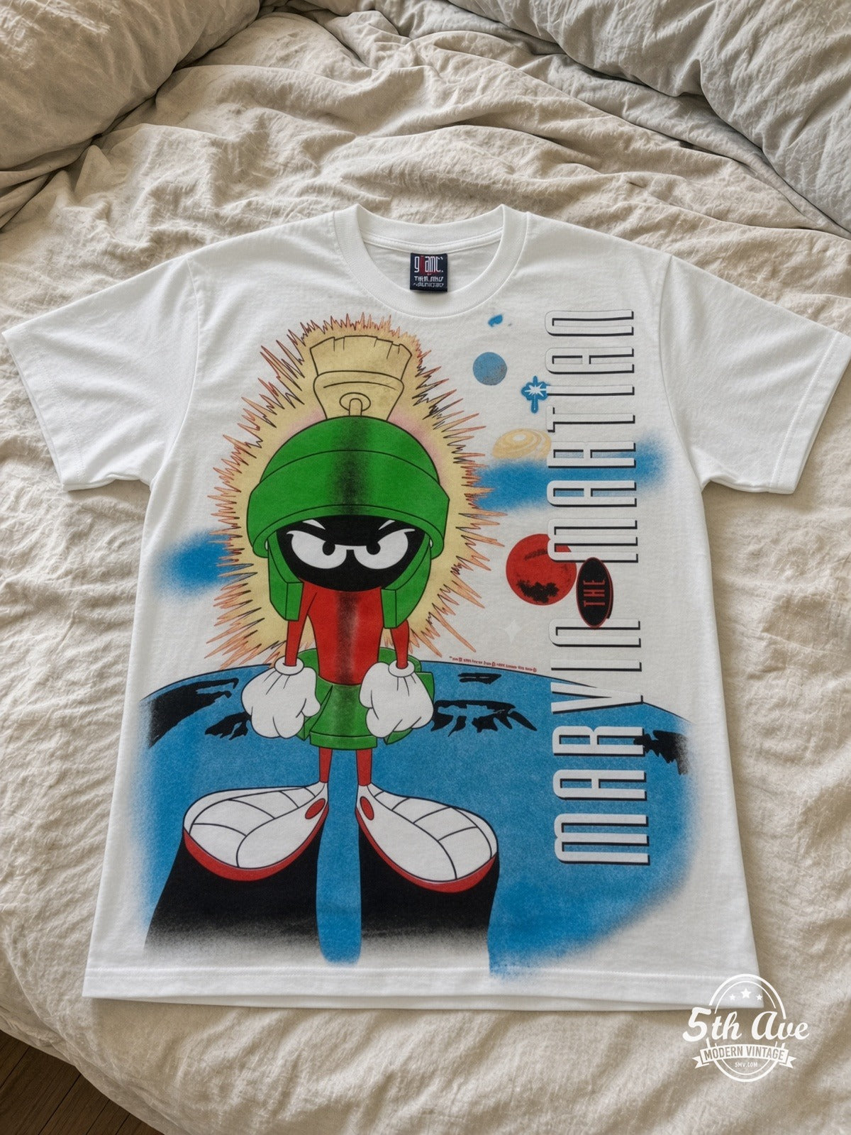 Looney Tunes Marvin the Martian Portrait vintage tee laid on bed