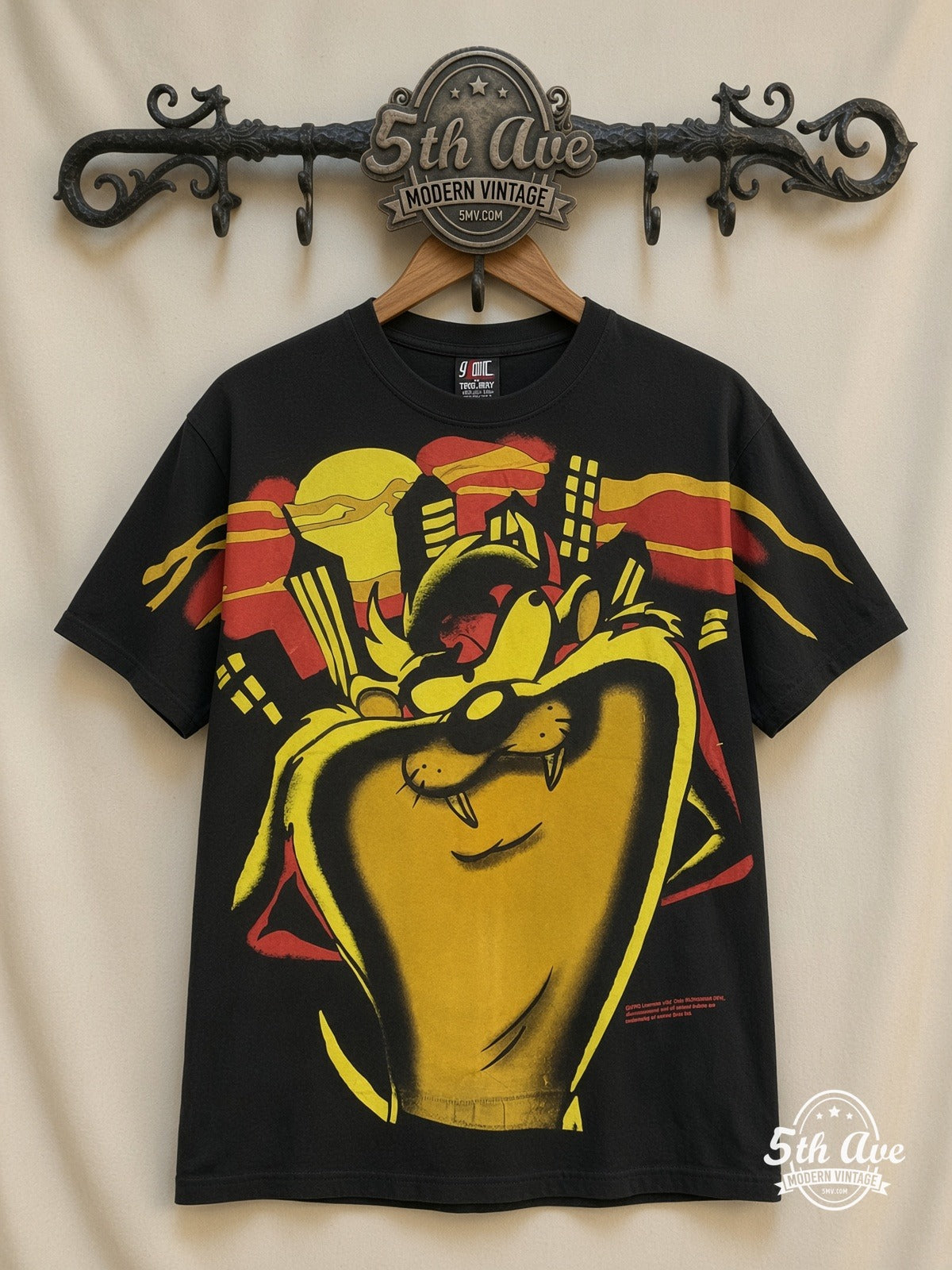 Looney Tunes Sylvester Giant Face Yellow all over print vintage cartoon t-shirt front on cream 5th Ave rack