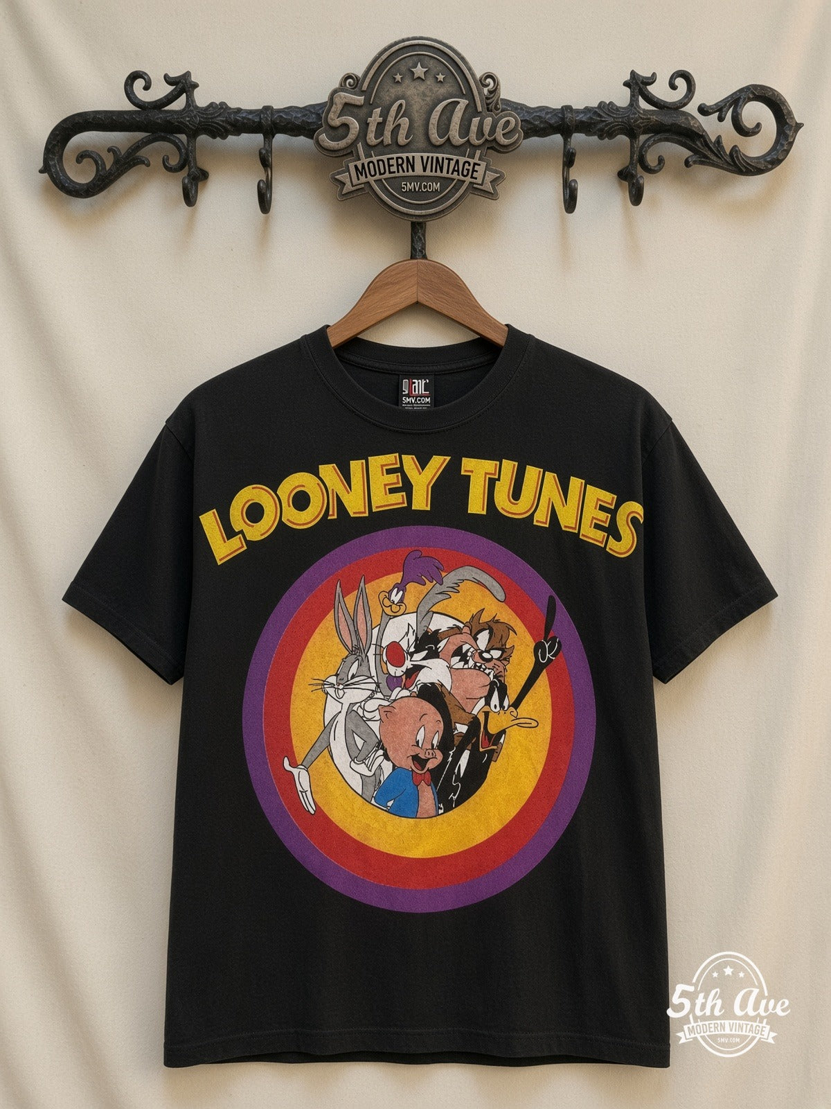 Looney Tunes Circle Badge Group Black vintage cartoon t-shirt front on cream 5th Ave rack