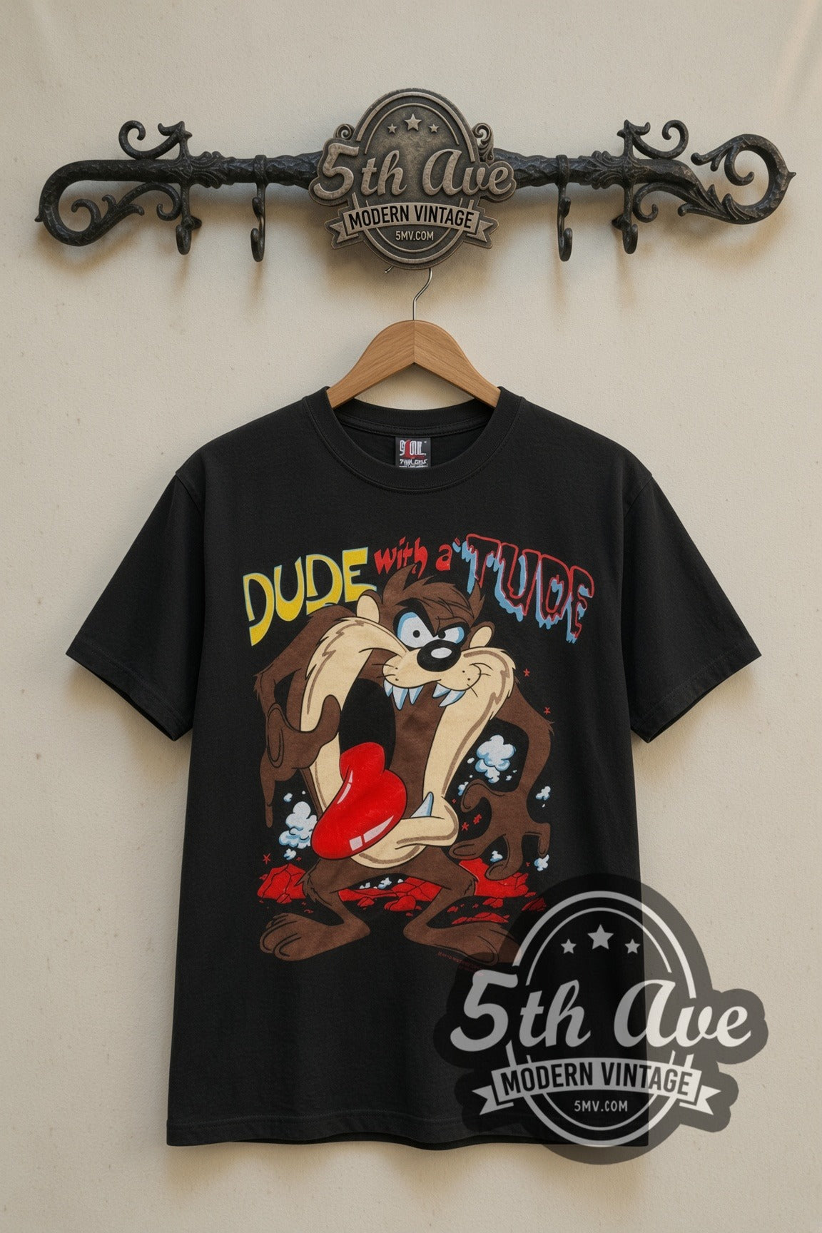 Looney Tunes Taz Dude with a Tude cartoon tee in black, front view on a display rack