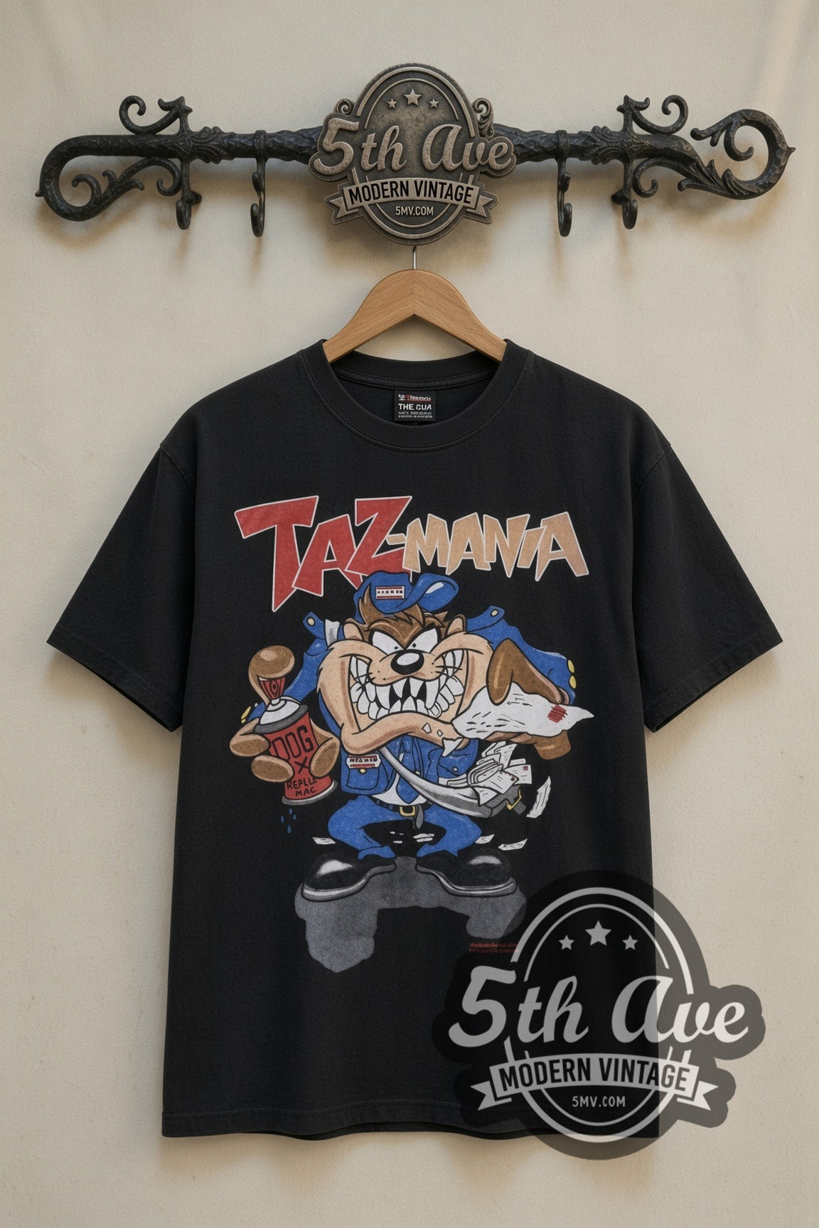 Looney Tunes Taz Hip-Hop Streetwear with Gossamer cartoon tee in black, front view on a display rack