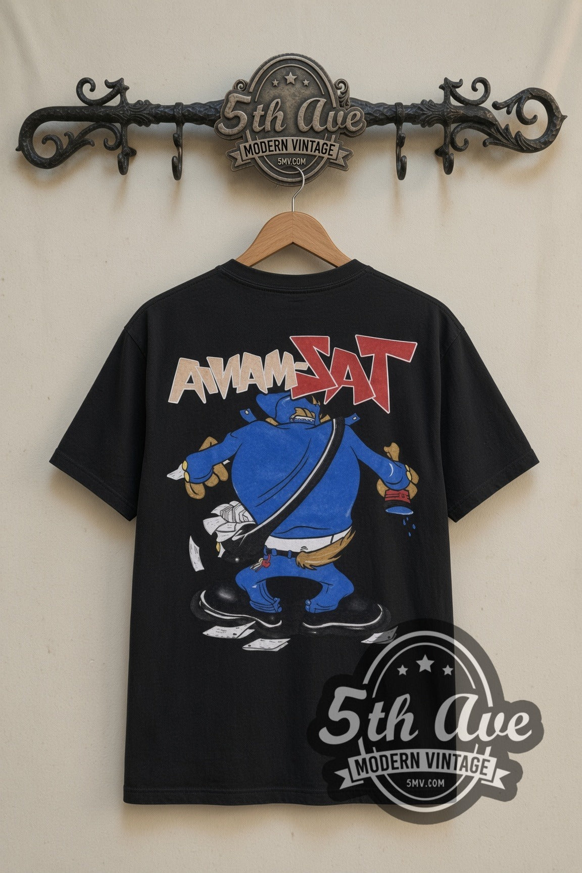 Looney Tunes Taz Hip-Hop Streetwear with Gossamer cartoon tee in black, back view on a display rack