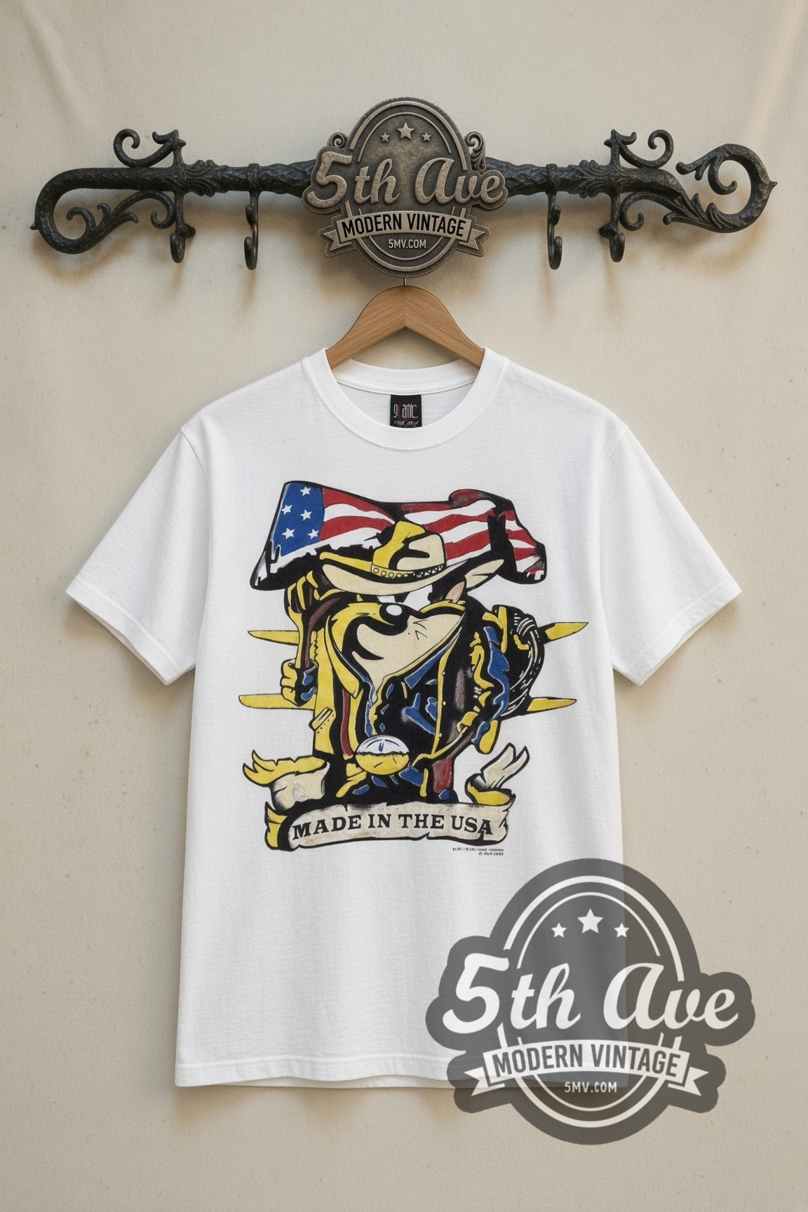 Looney Tunes Taz Made in the USA Cowboy Flag cartoon tee in white, front view on a display rack