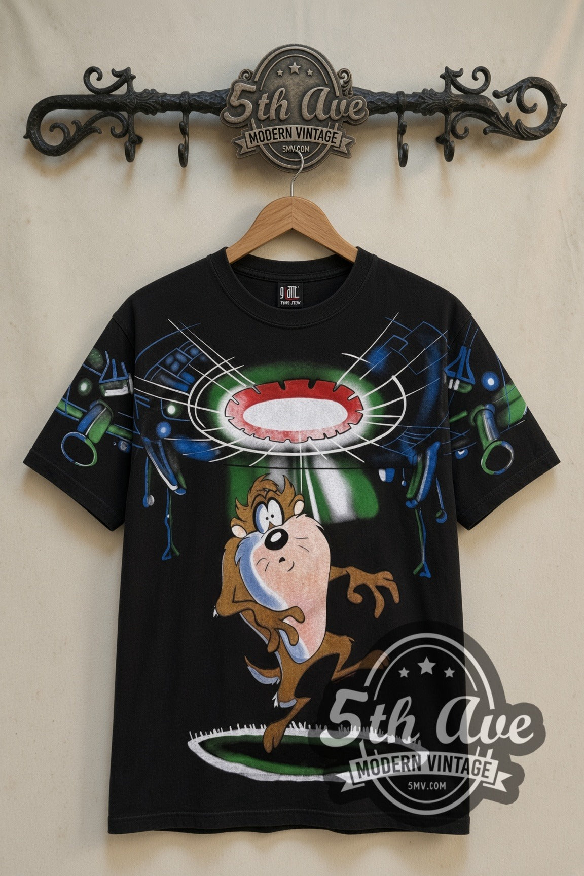 Looney Tunes Taz Rejected UFO cartoon tee in black, front view on a display rack