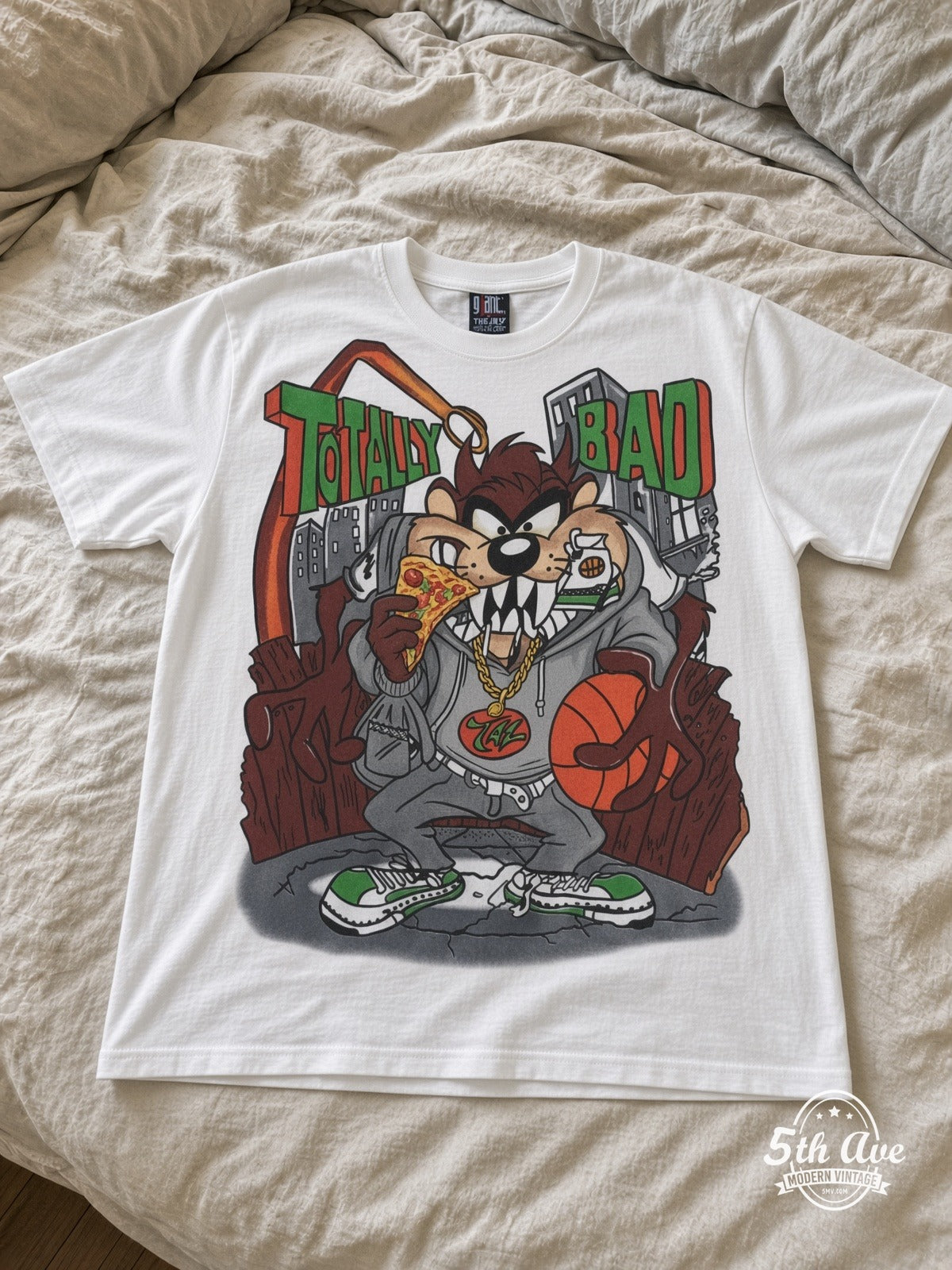 Looney Tunes Taz Totally Bad Hip-Hop vintage tee laid on bed