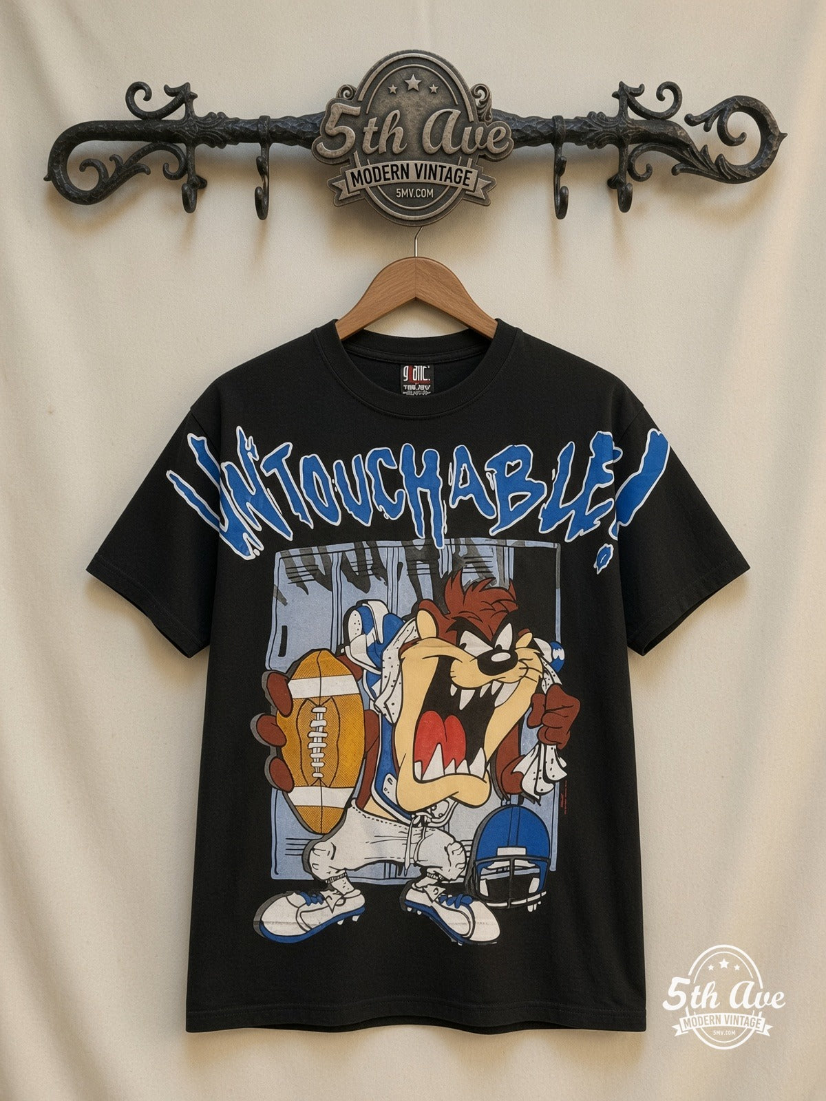 Looney Tunes Taz Untouchable Football all over print vintage cartoon t-shirt front on cream 5th Ave rack