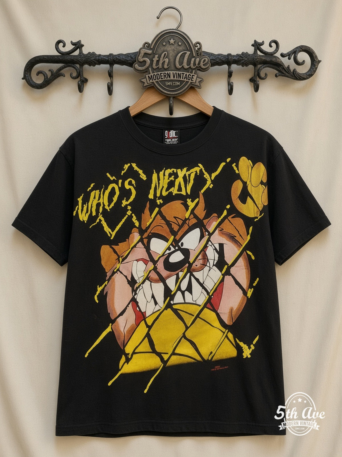 Looney Tunes Taz Who's Next all over print vintage cartoon t-shirt front on cream 5th Ave rack