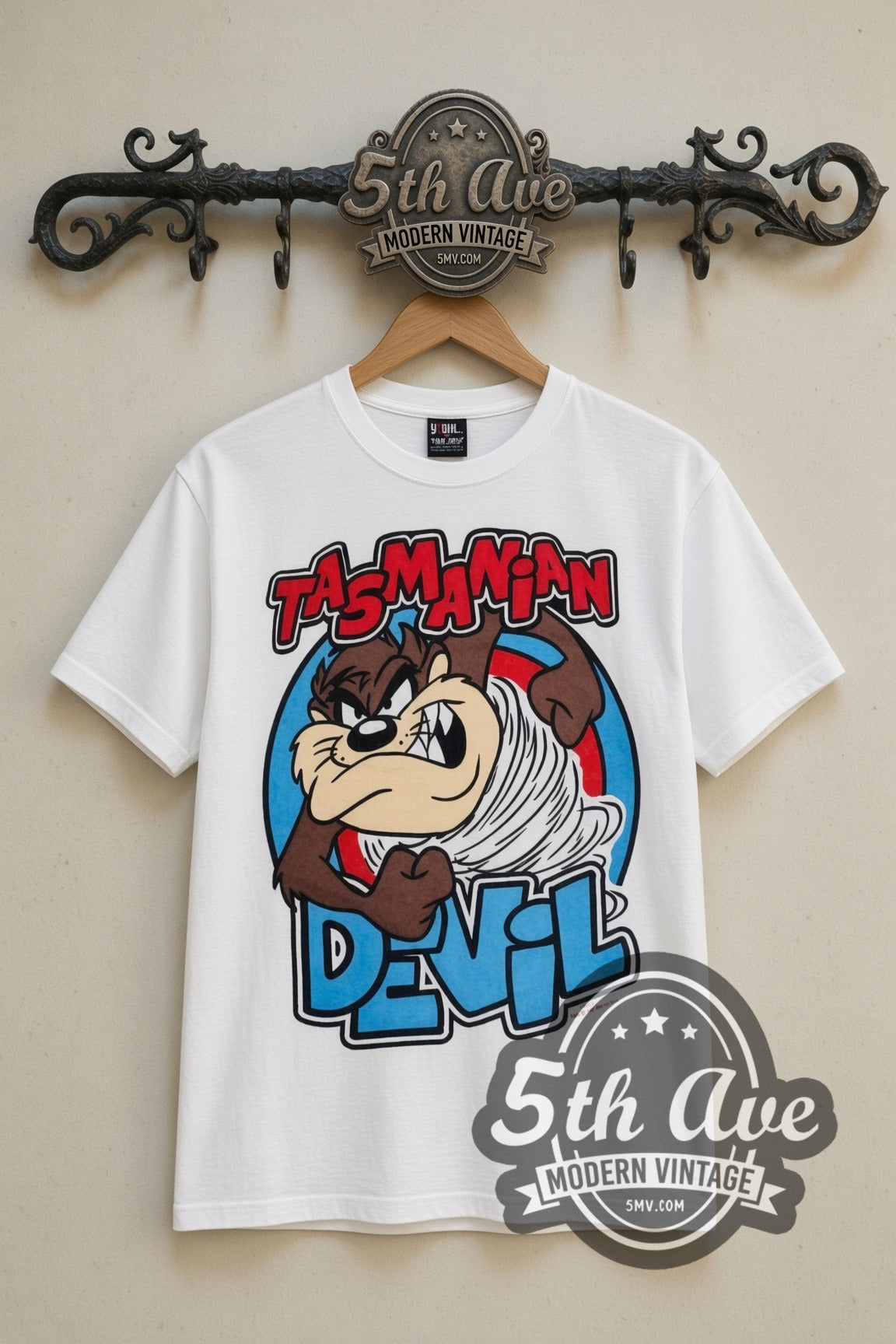 Looney Tunes Taz's Gym No Pencilnecks cartoon tee in white, front view on a display rack
