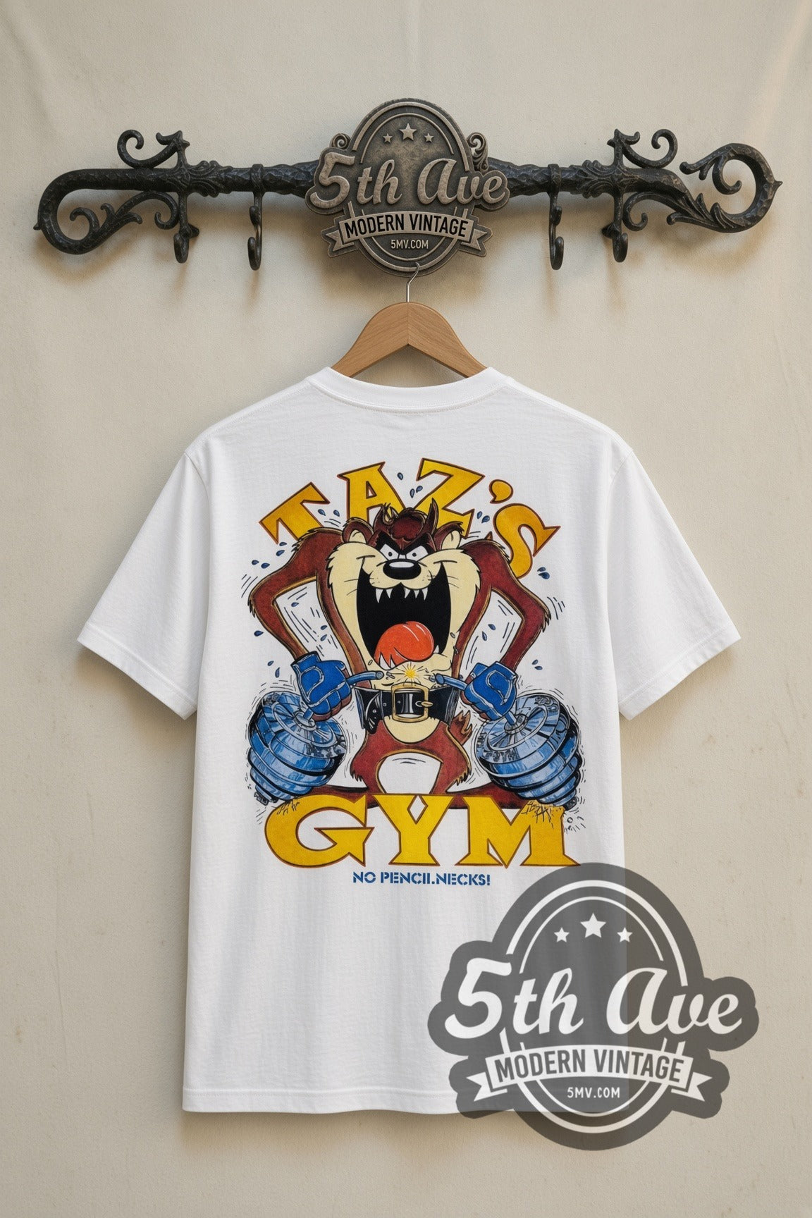 Looney Tunes Taz's Gym No Pencilnecks cartoon tee in white, back view on a display rack