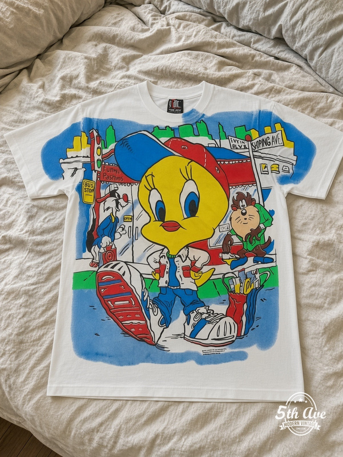 Looney Tunes Tweety Streetwear City vintage tee laid on bed