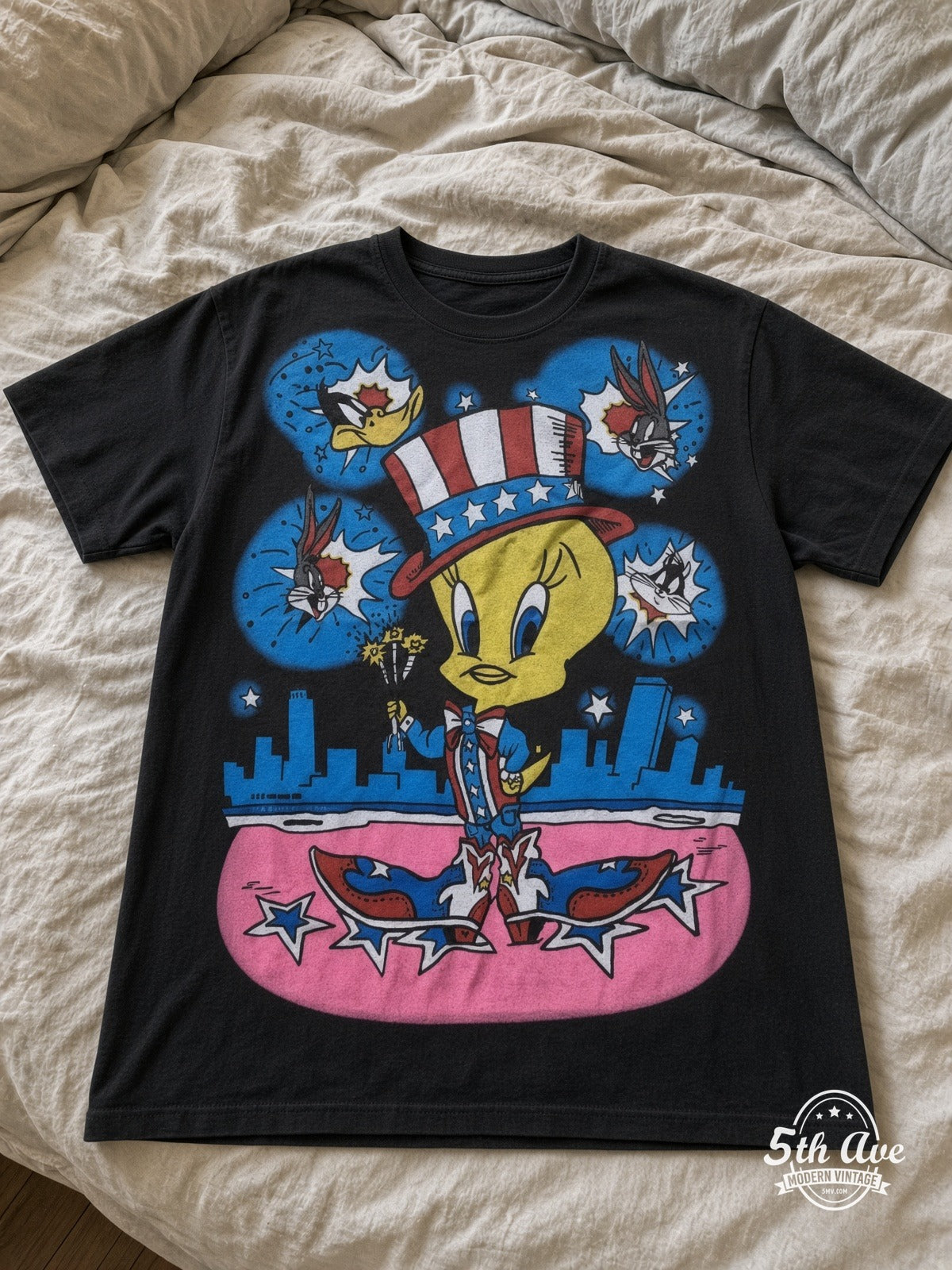 Looney Tunes Tweety Uncle Sam Patriotic vintage tee laid on bed