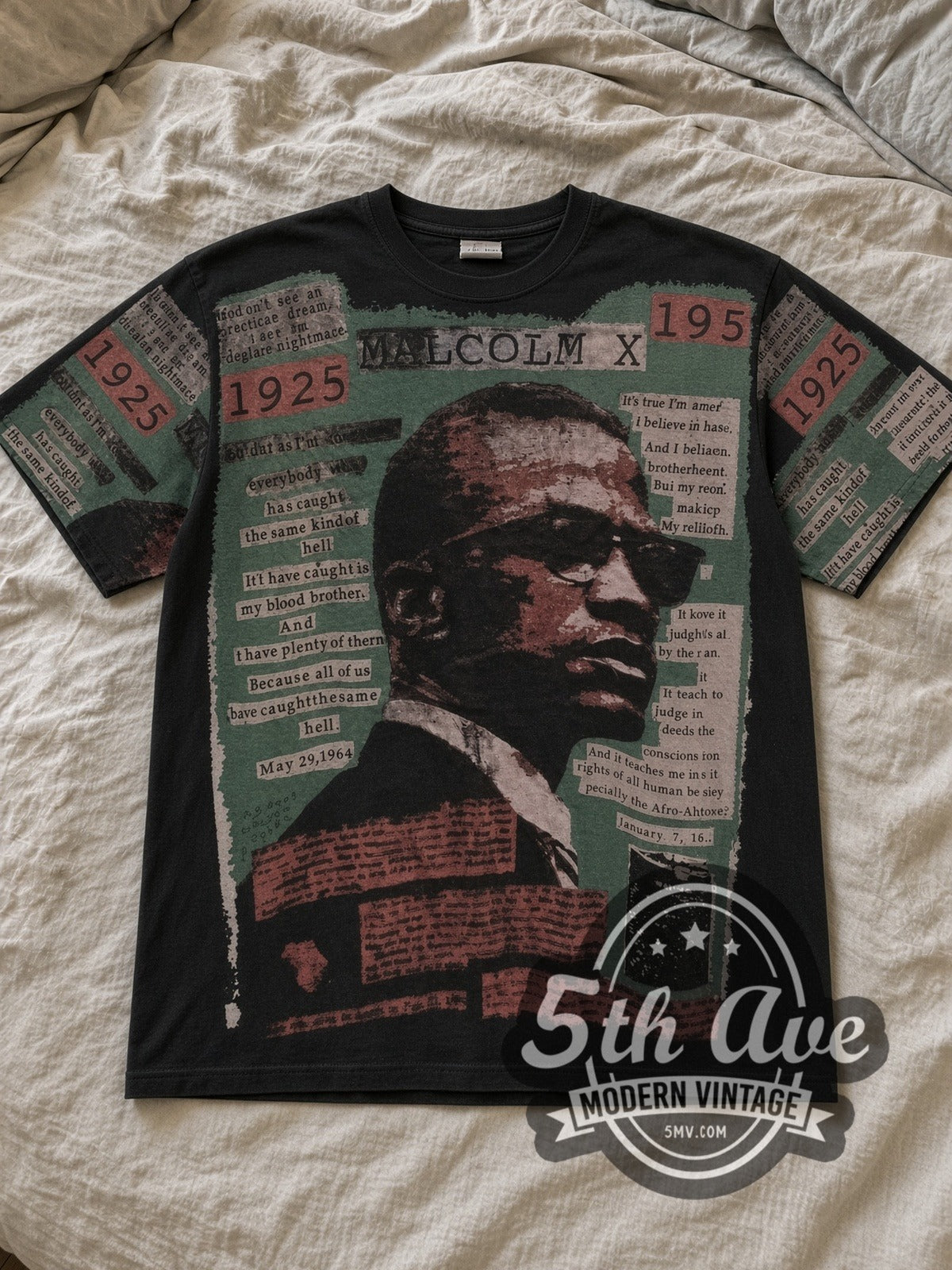 Black Malcolm X Mosquitohead All Over Print Vintage Movie T-Shirt laid flat on a linen bed