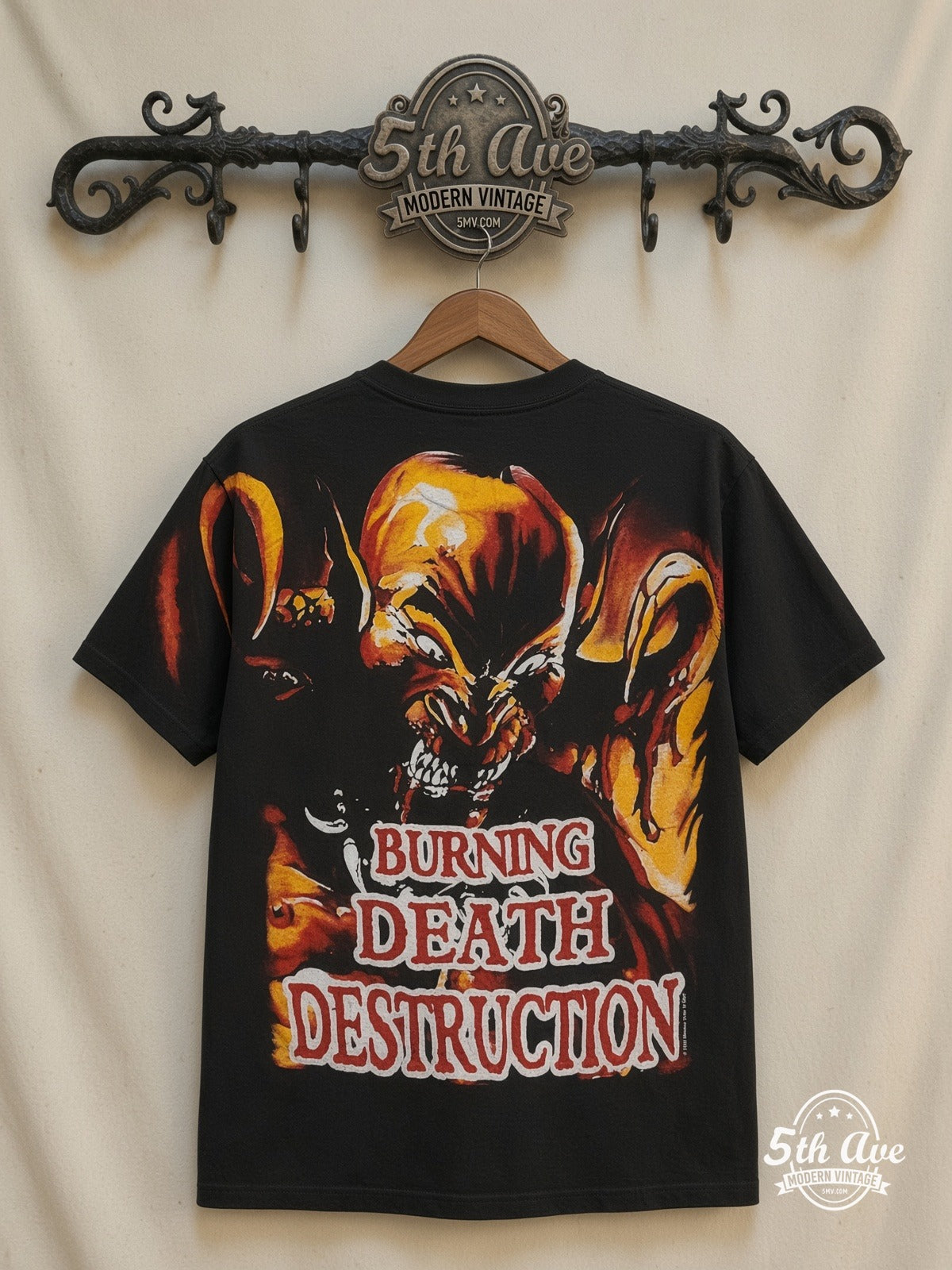 Manowar Burning Death Destruction all over print vintage tee laid on bed
