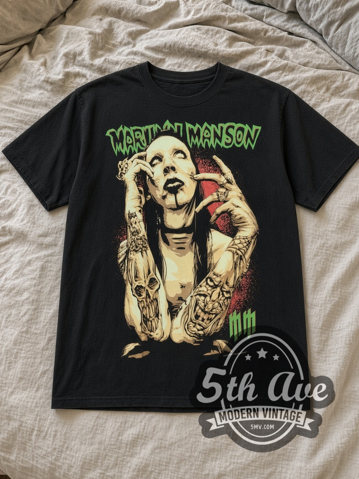Black Marilyn Manson New Retro Style Vintage Band T-Shirt laid flat on a linen bed