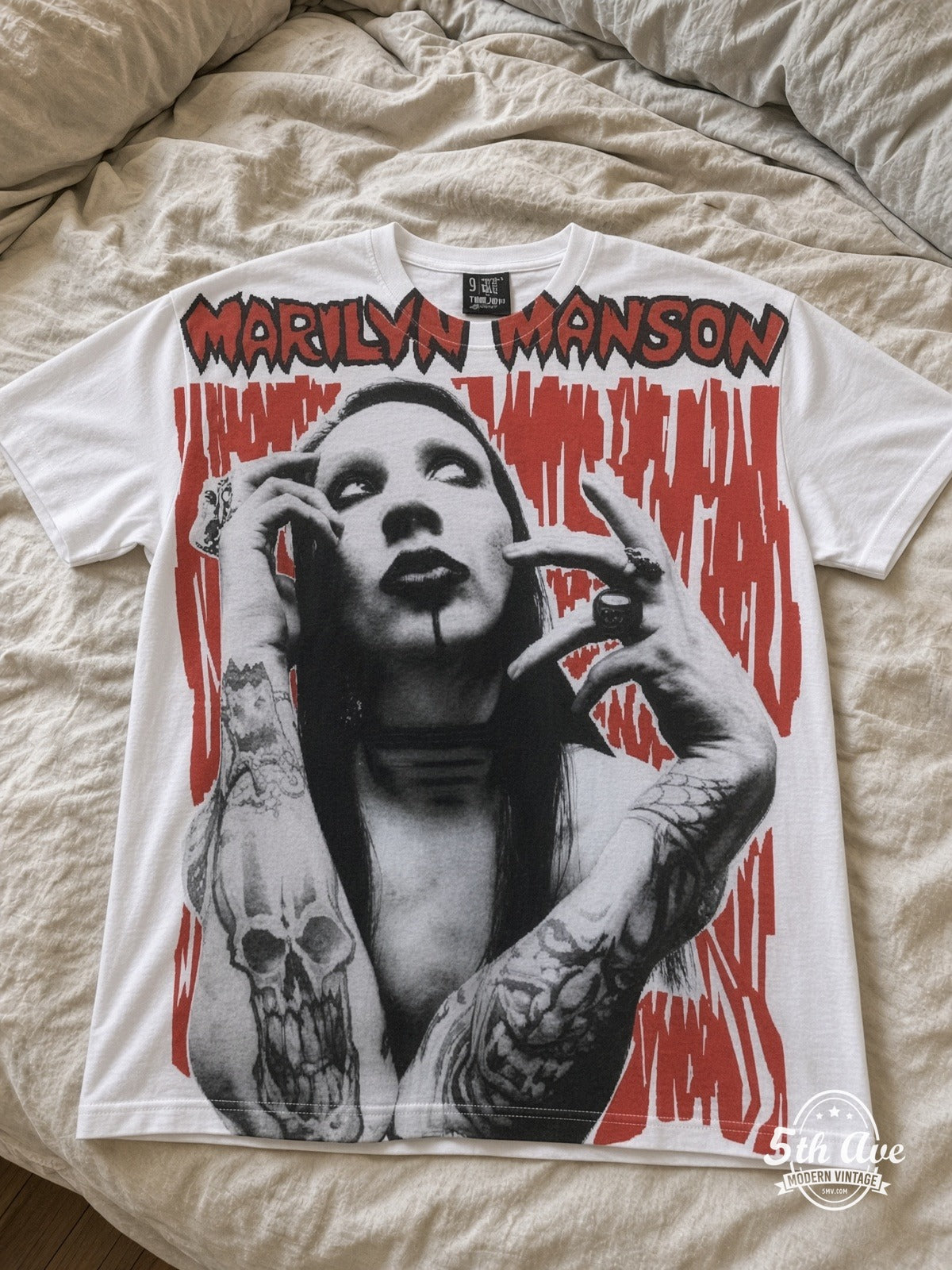 Marilyn Manson Face Closeup all over print vintage tee laid on bed