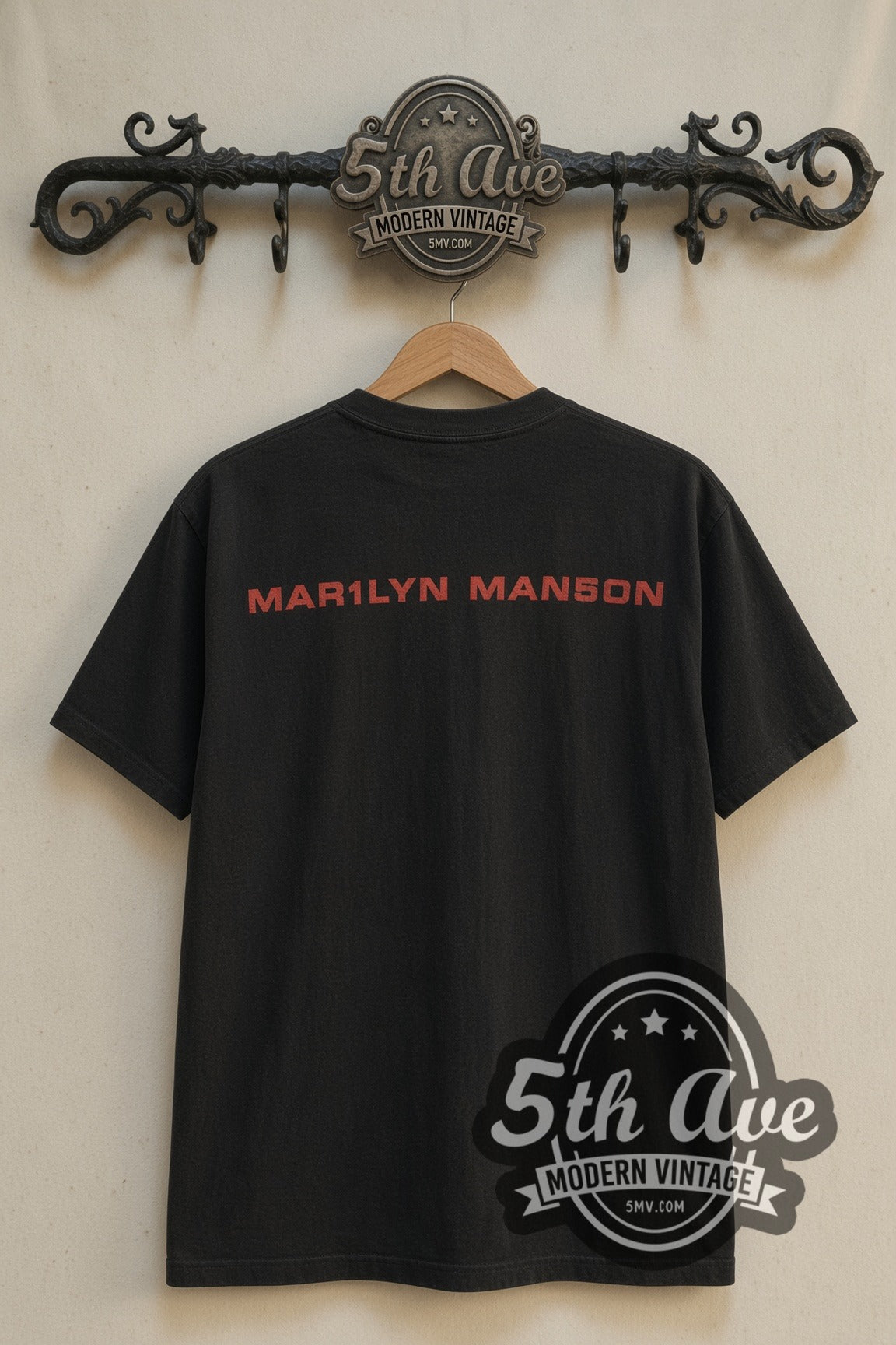 Back print of Marilyn Manson God Is in the TV Blue Face tee on 5th Ave rack