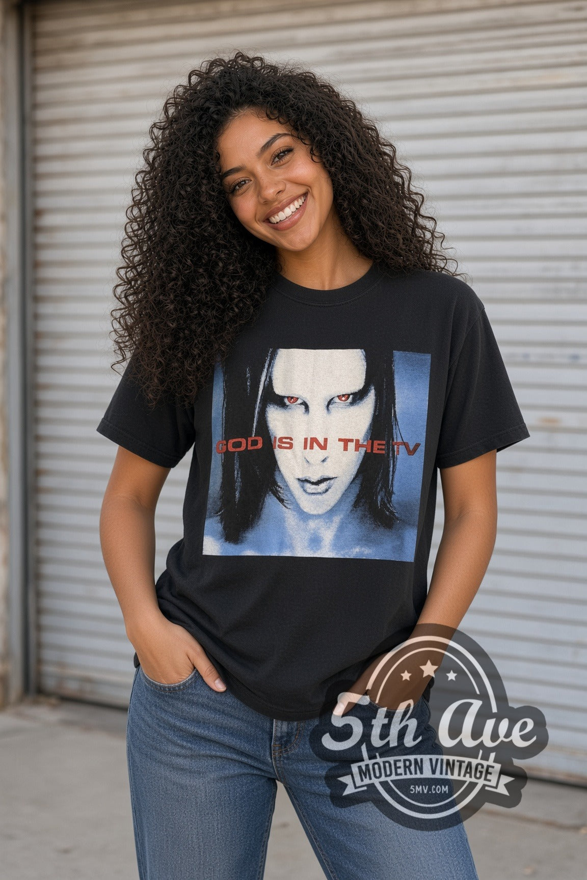 Woman wearing black Marilyn Manson God Is in the TV Blue Face vintage band t-shirt