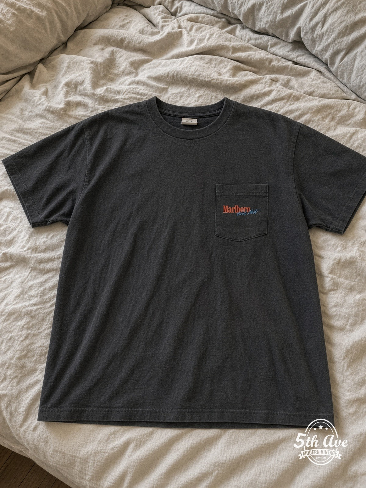 Marlboro Cowboy Pocket vintage tee laid on bed
