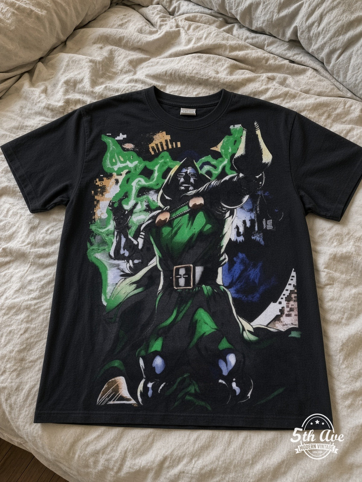 Marvel Dr Doom Standing Portrait vintage tee laid on bed