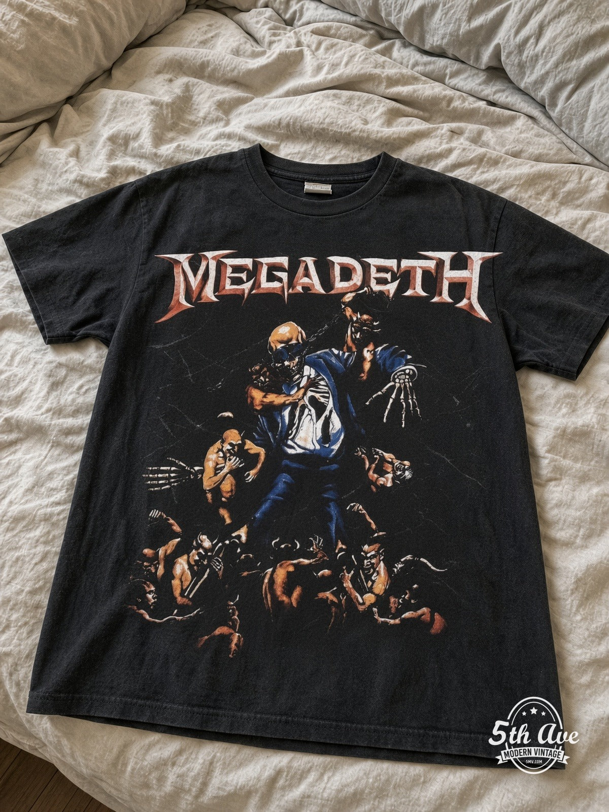 Megadeth Skeleton Apocalypse all over print vintage tee laid on bed