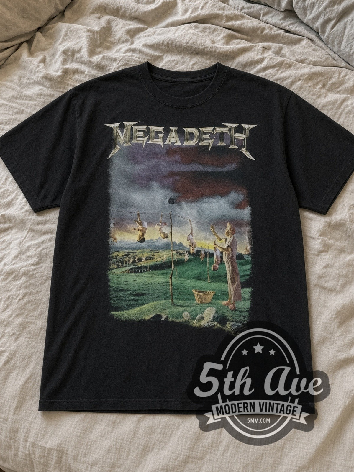 Black Megadeth Youthanasia Tour 1995 Vintage Band T-Shirt laid flat on a linen bed