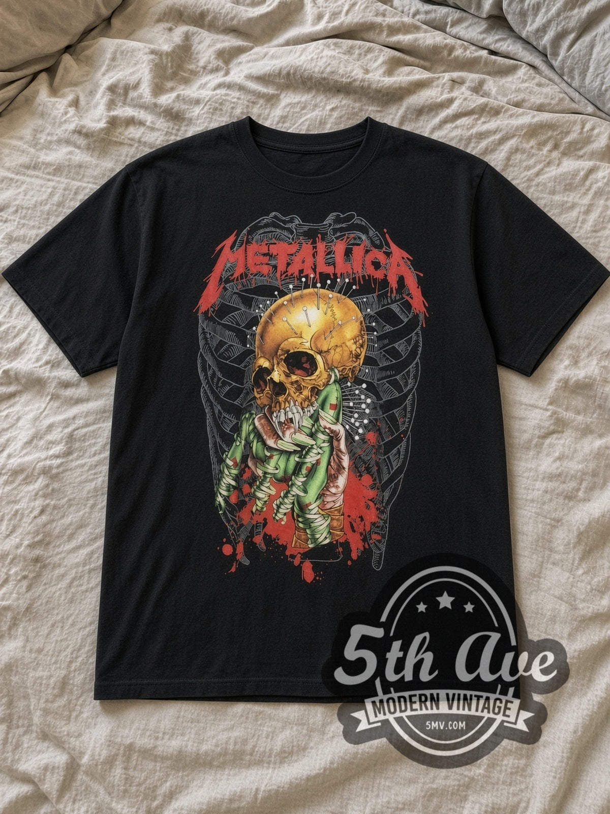 Black Metallica Yellow Skull Green Claw Blood Splash Vintage Band T-Shirt laid flat on a linen bed