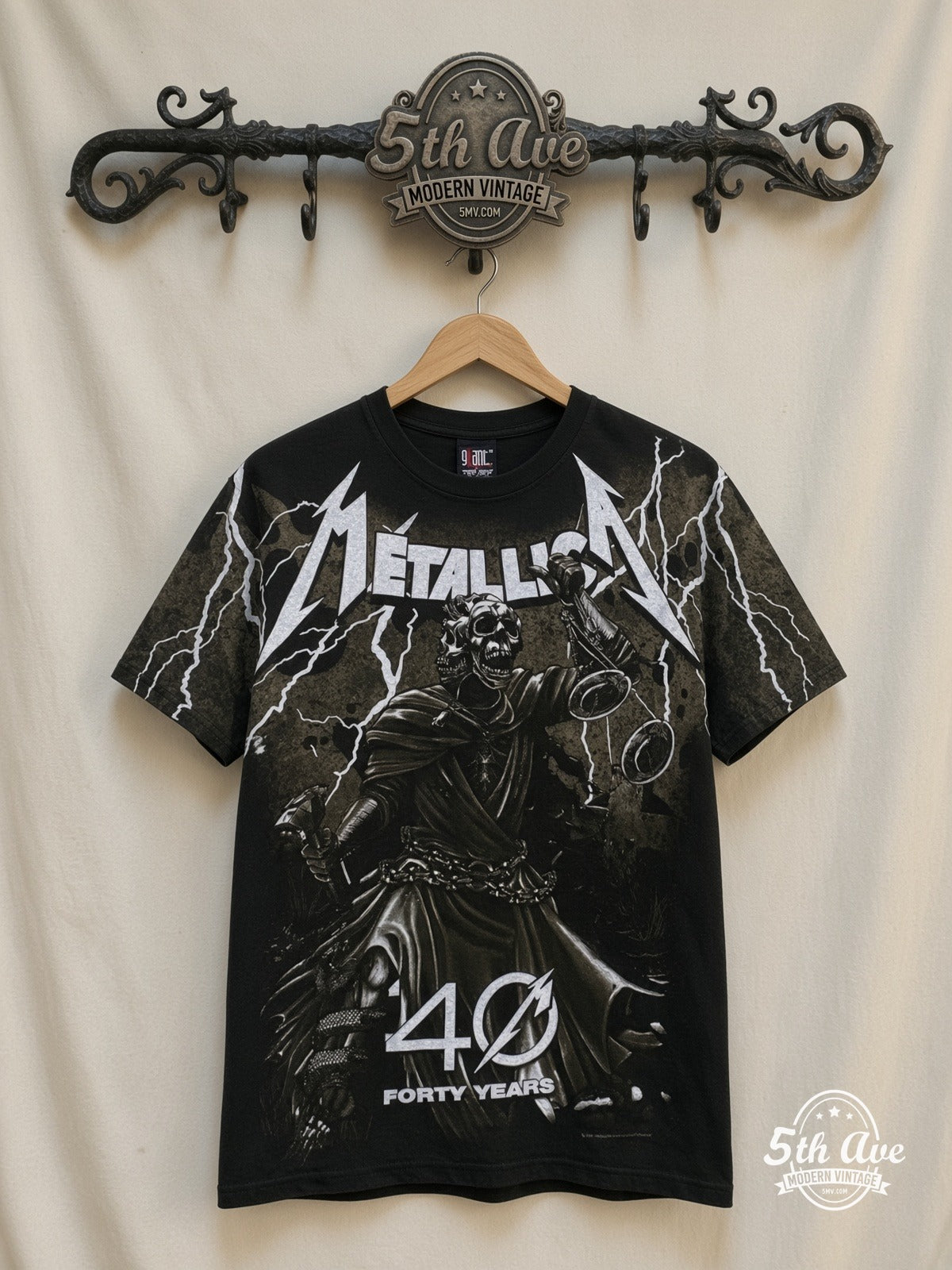 Metallica 40 Years Lady Justice all over print vintage band t-shirt front on cream 5th Ave rack