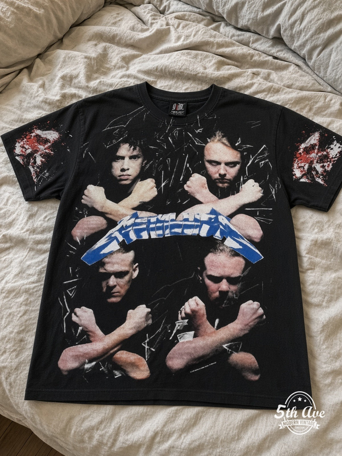 Metallica Band Portraits Skulls all over print vintage tee laid on bed