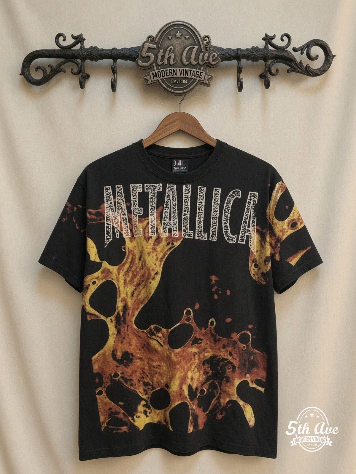 Metallica Liquid Fire all over print vintage band t-shirt front on cream 5th Ave rack