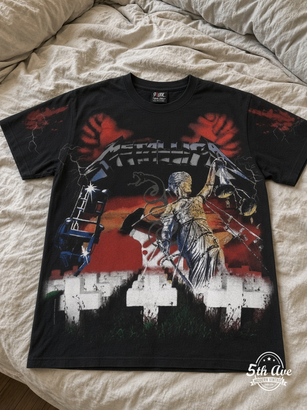 Metallica Master of Puppets Graveyard all over print vintage tee laid on bed